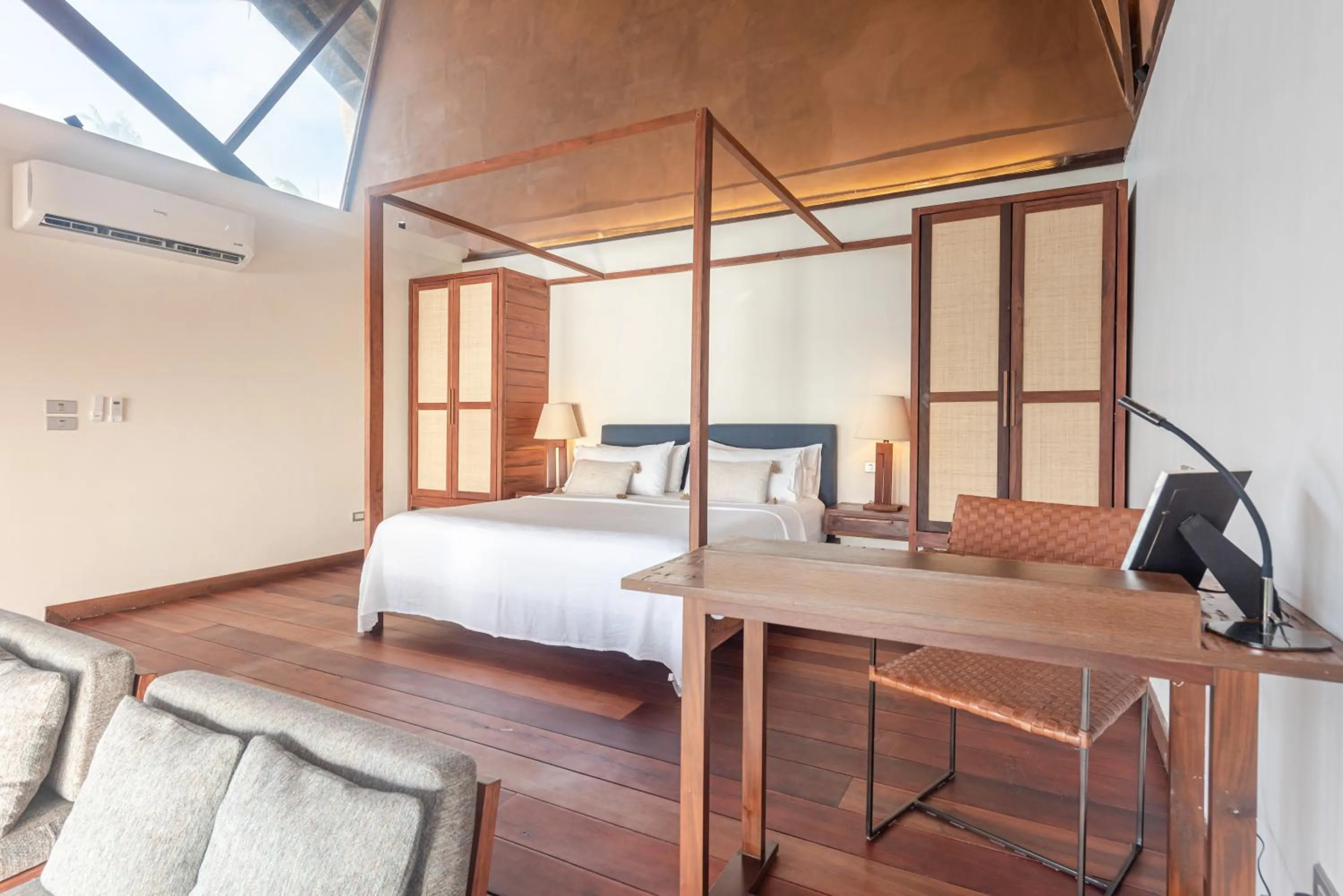 Bed in L'Osteria Luxe Beachfront B&B