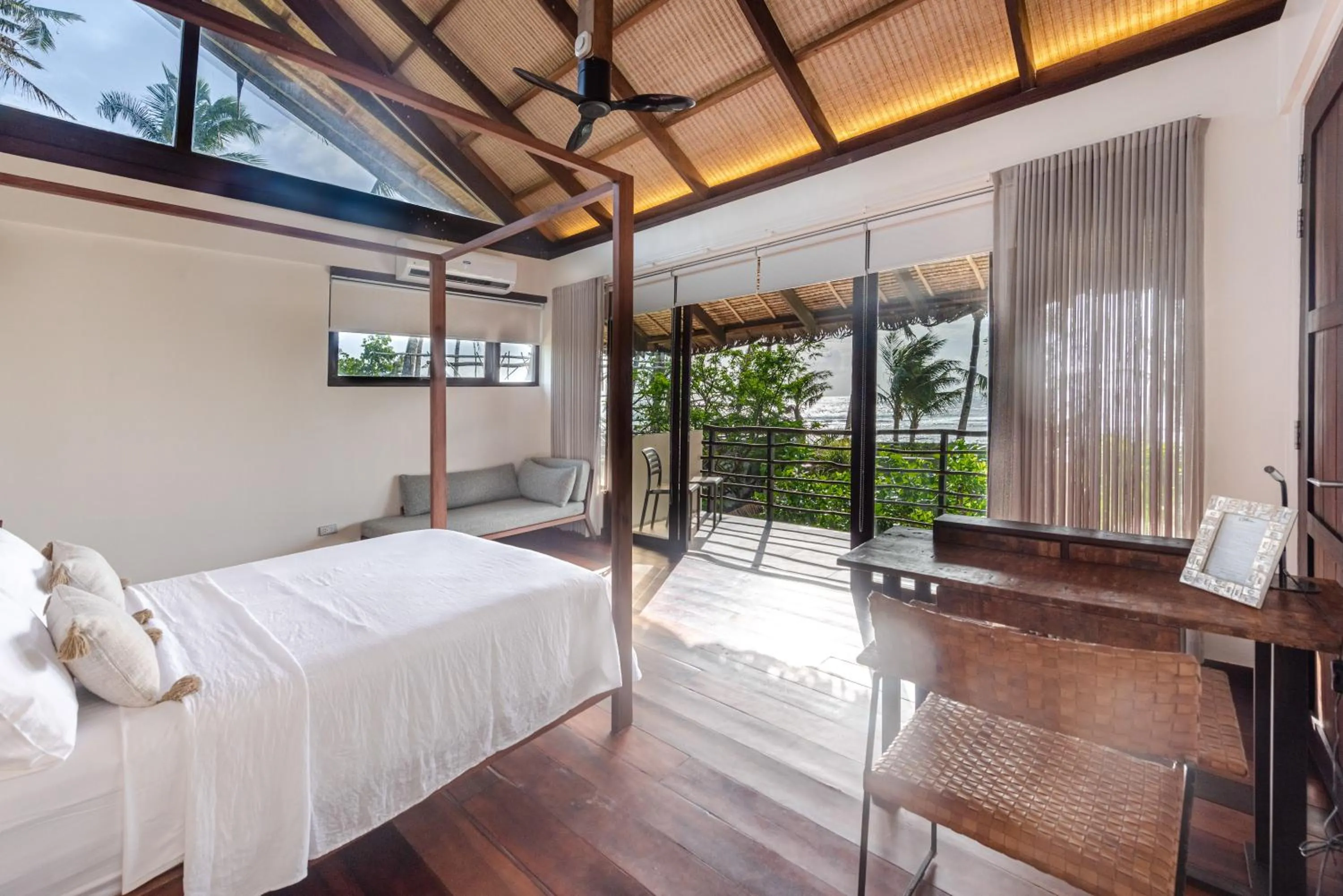 Bed in L'Osteria Luxe Beachfront B&B