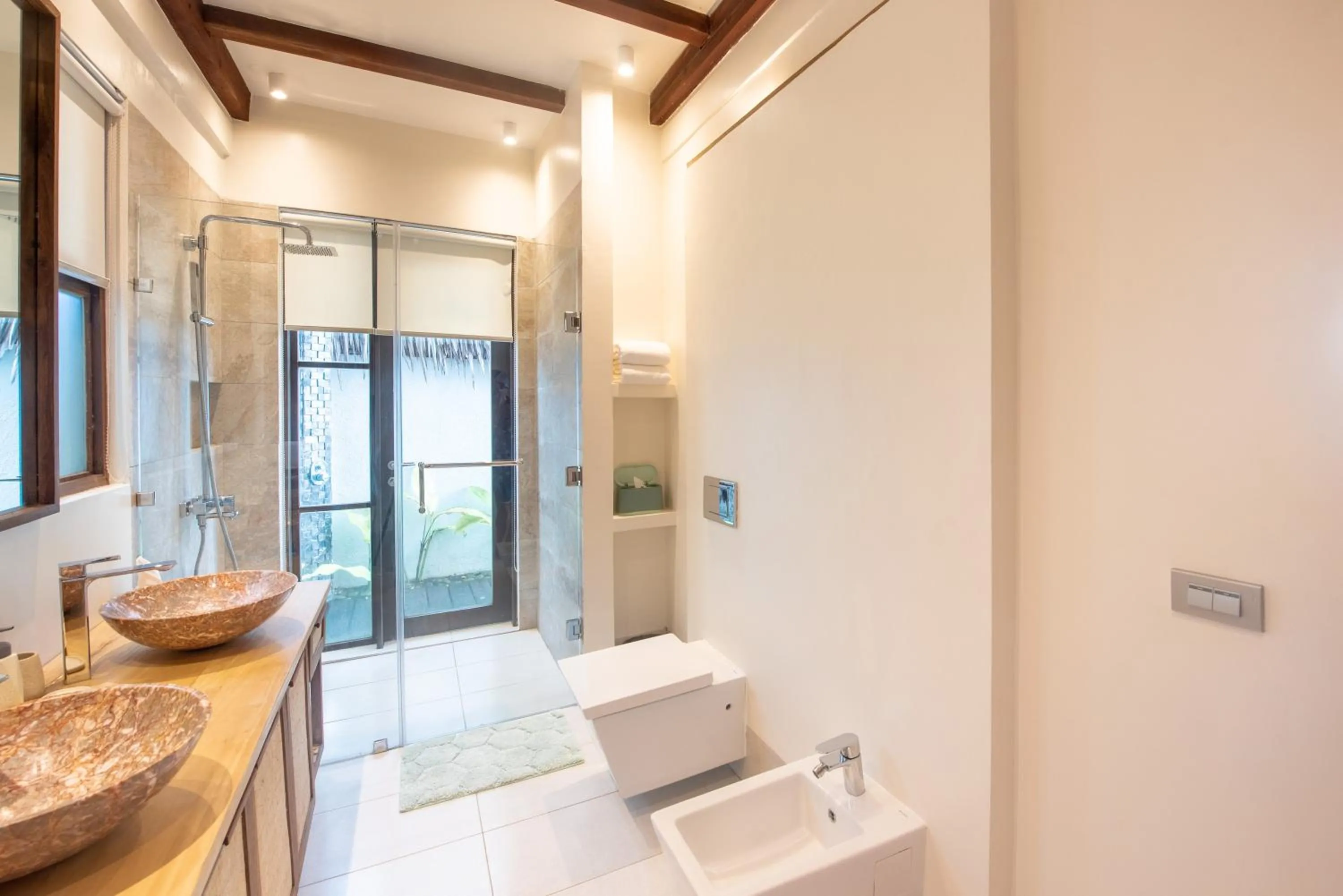 Toilet in L'Osteria Luxe Beachfront B&B