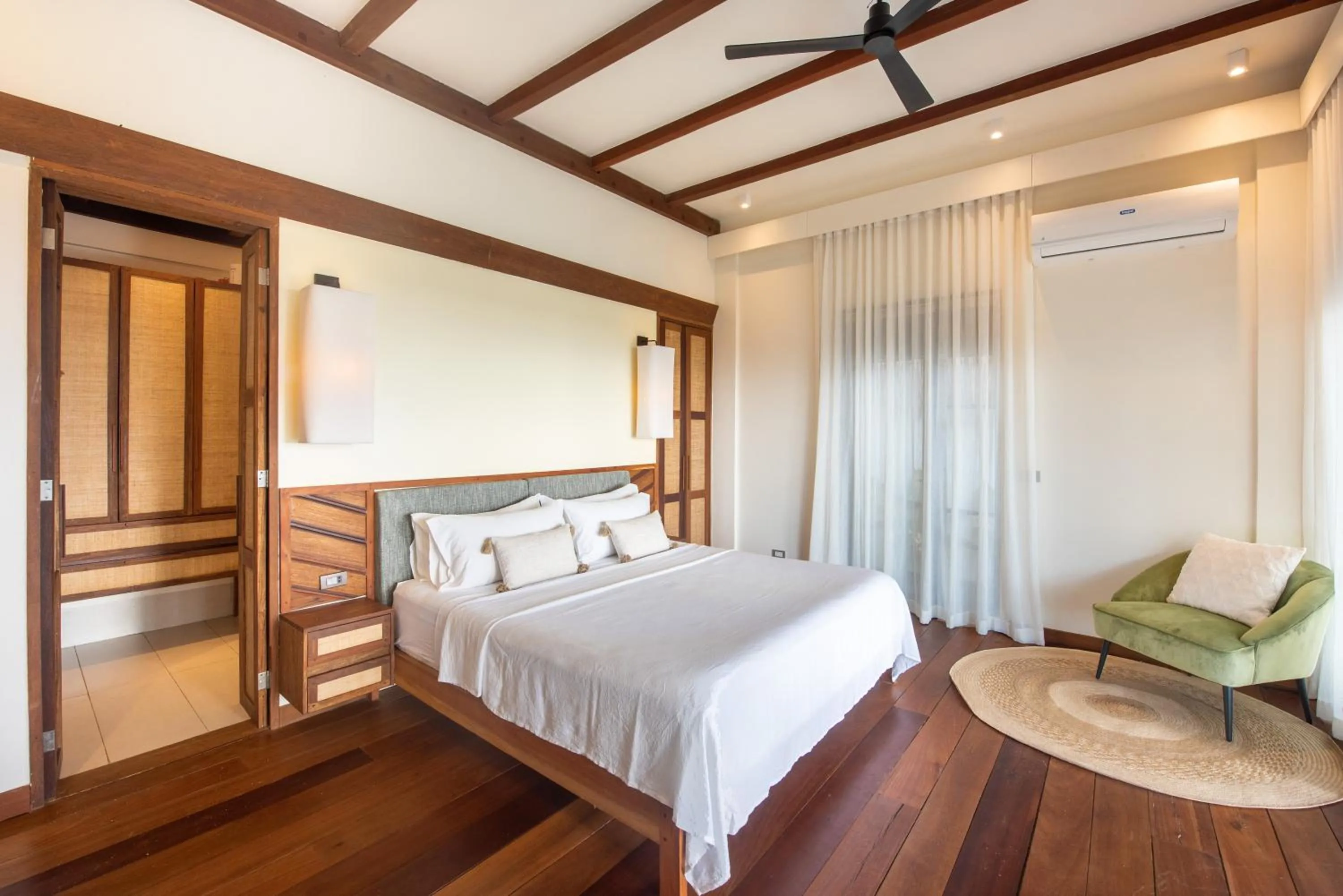 Bed in L'Osteria Luxe Beachfront B&B