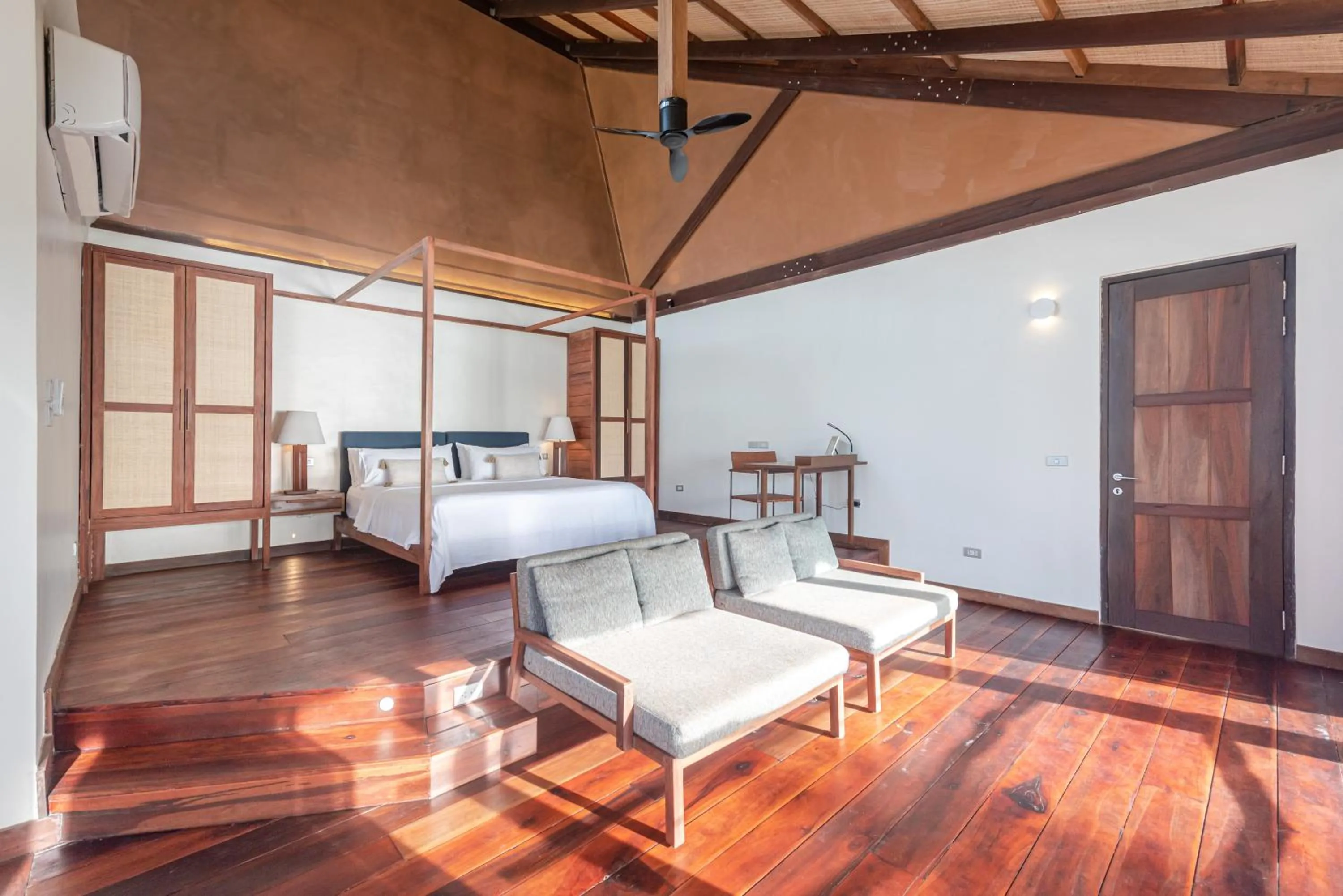 Bed in L'Osteria Luxe Beachfront B&B