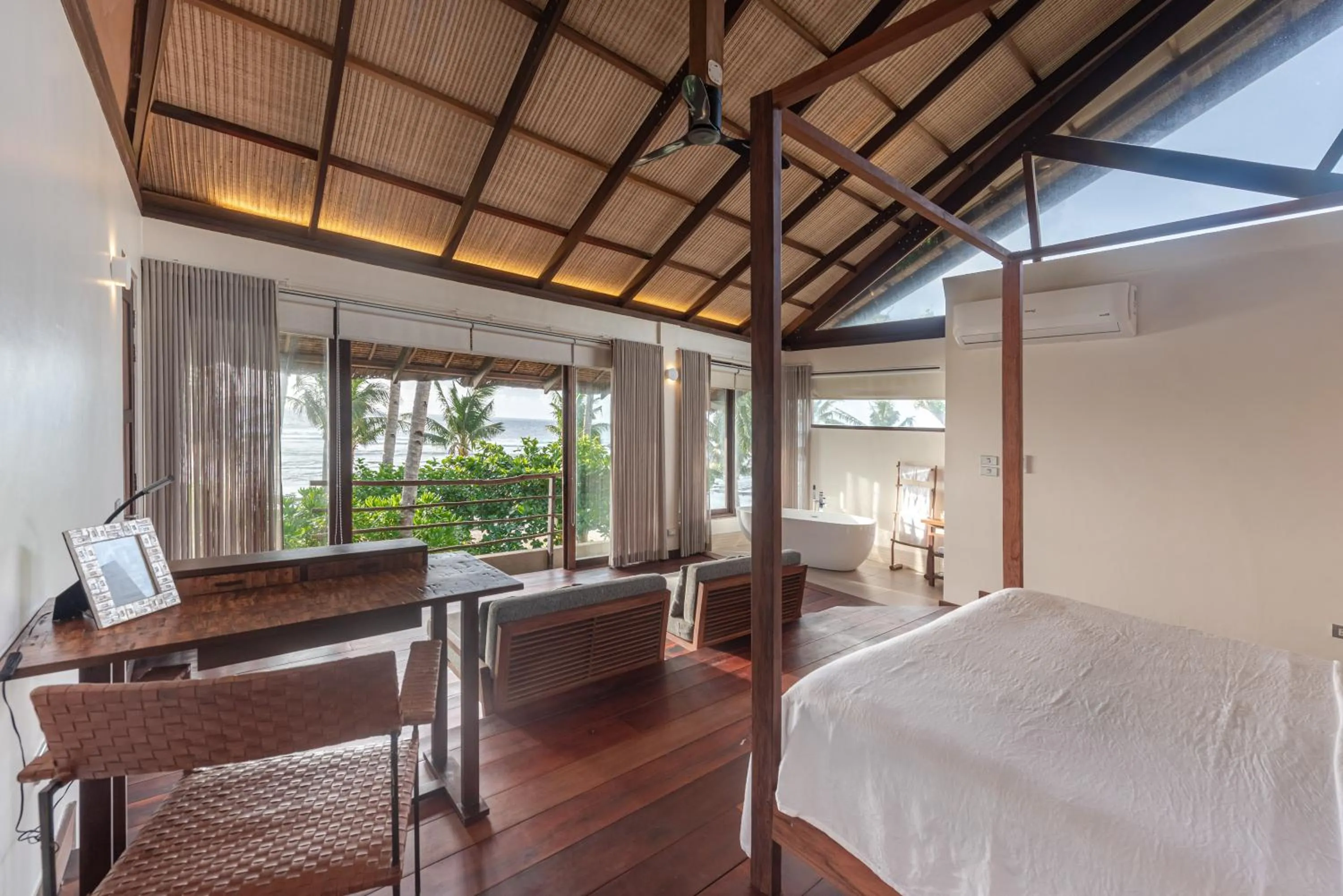 Bed in L'Osteria Luxe Beachfront B&B