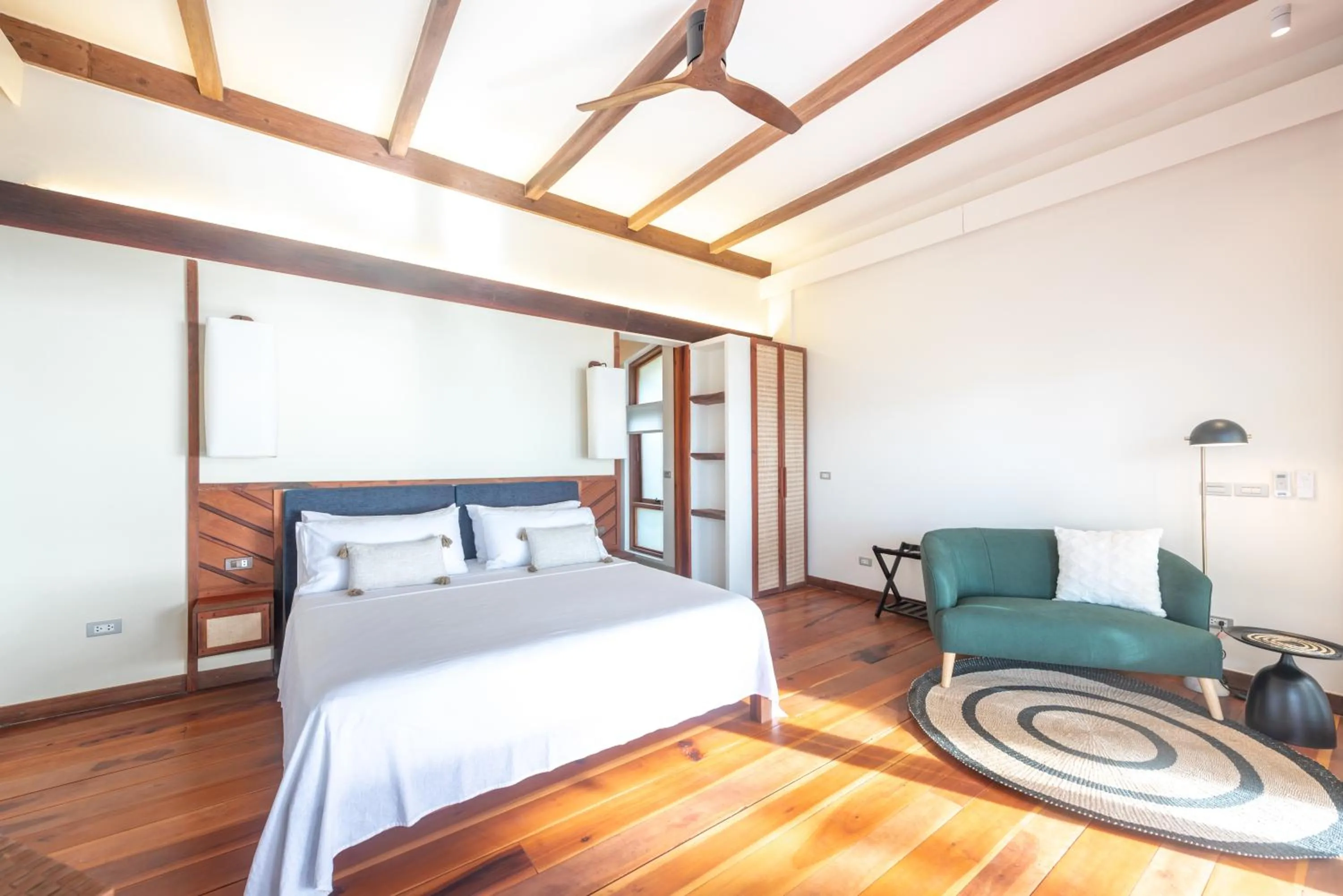 Bed in L'Osteria Luxe Beachfront B&B