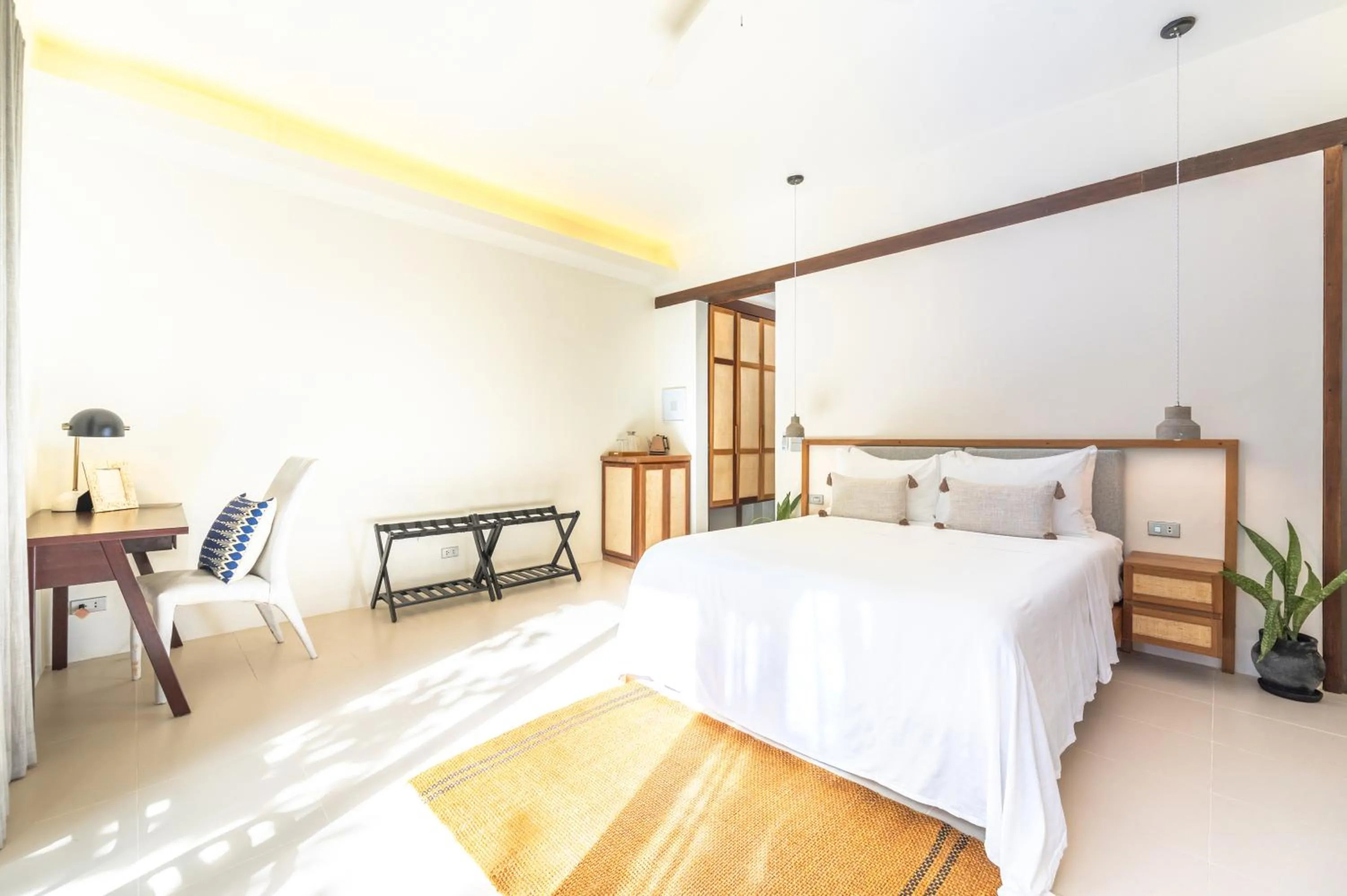 Bed in L'Osteria Luxe Beachfront B&B