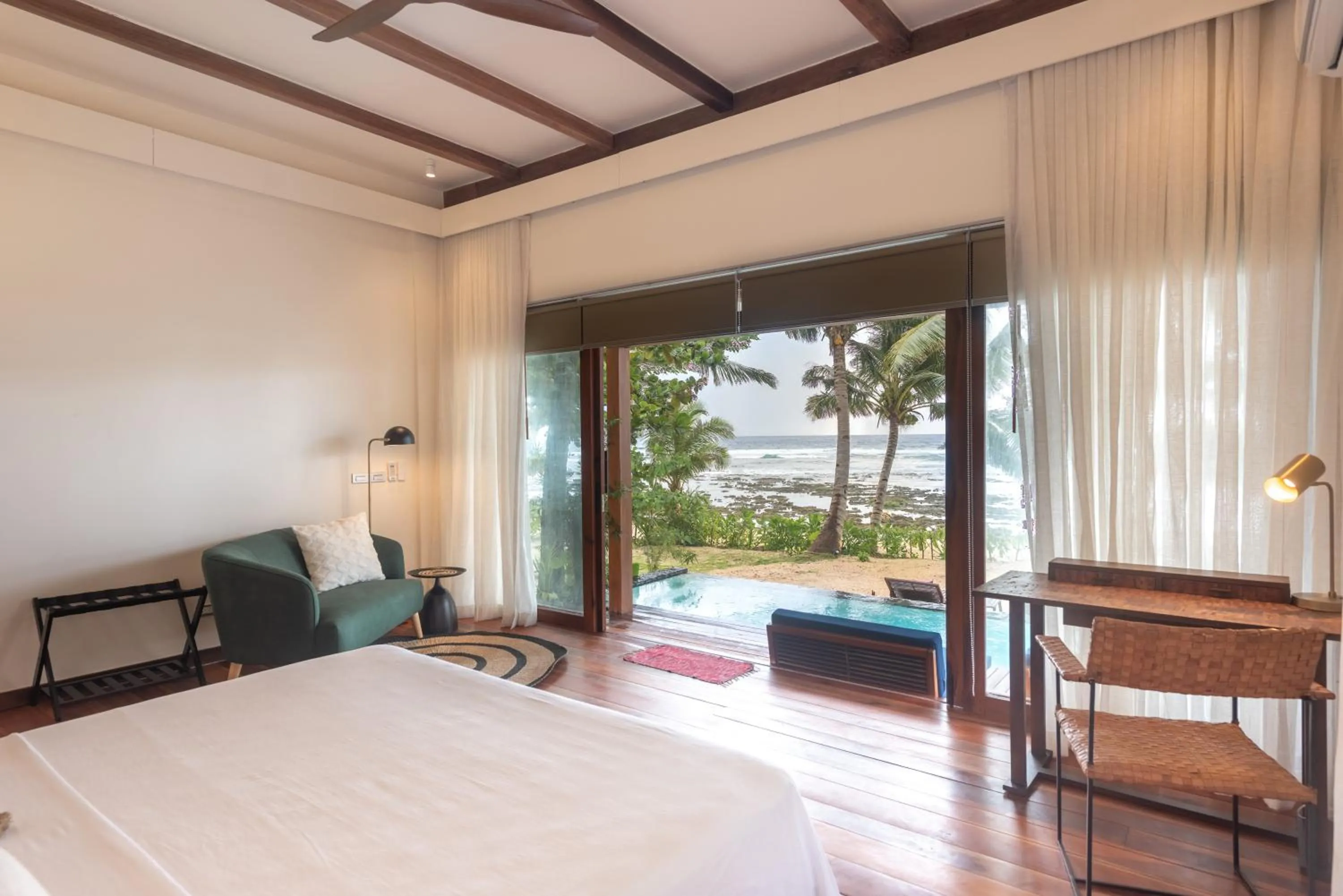 Bed in L'Osteria Luxe Beachfront B&B