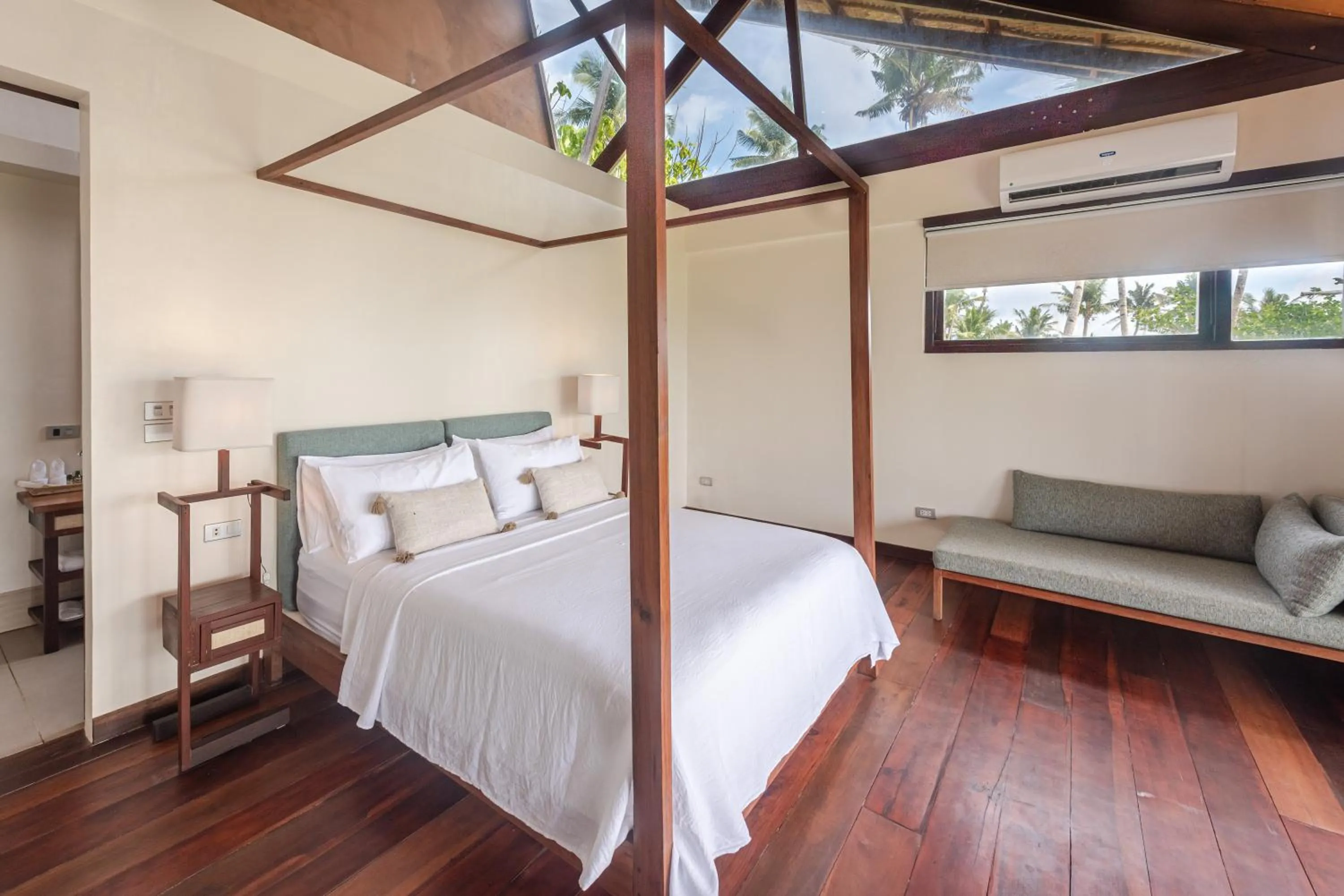 Bed in L'Osteria Luxe Beachfront B&B