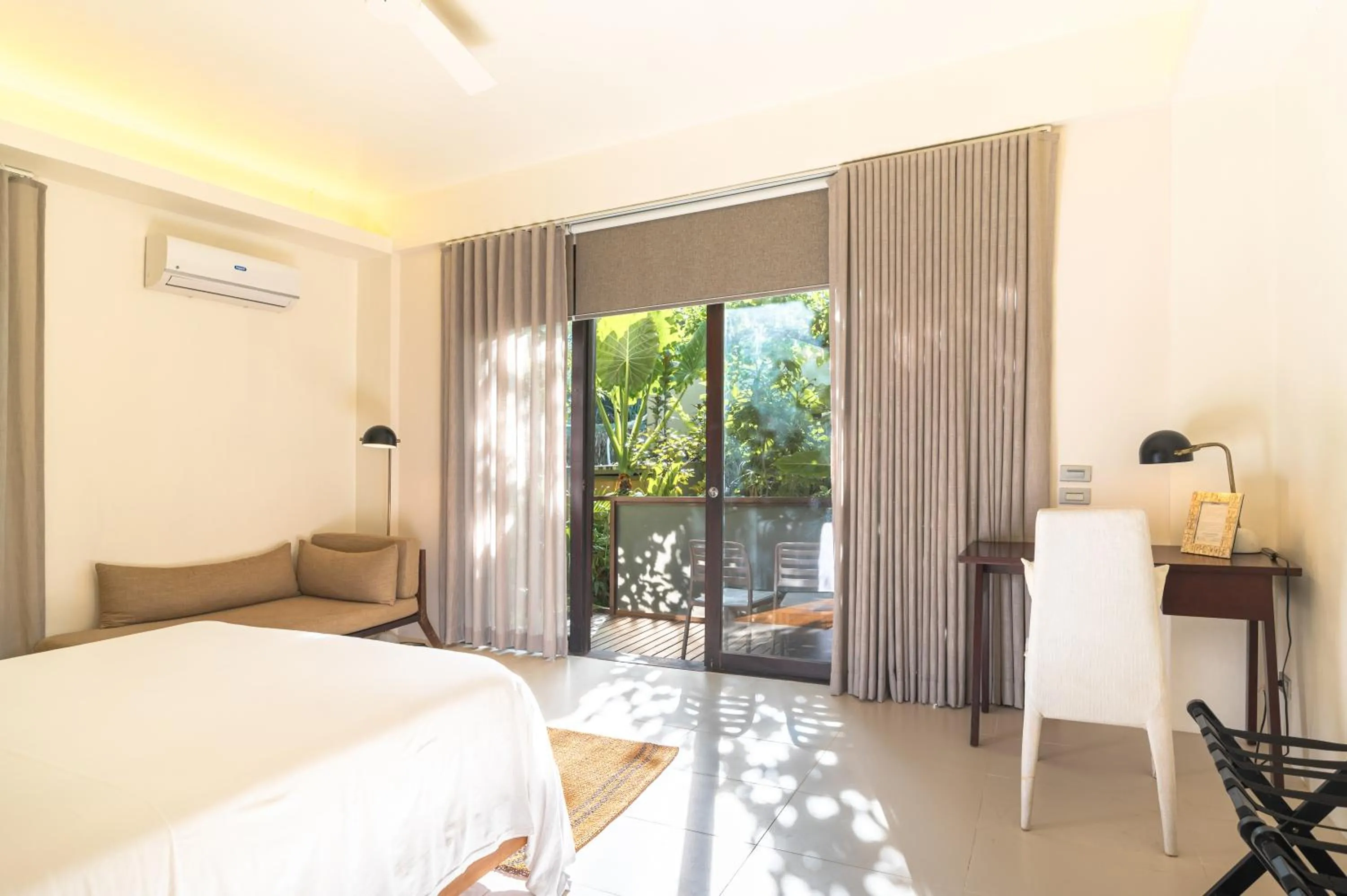 Bed in L'Osteria Luxe Beachfront B&B