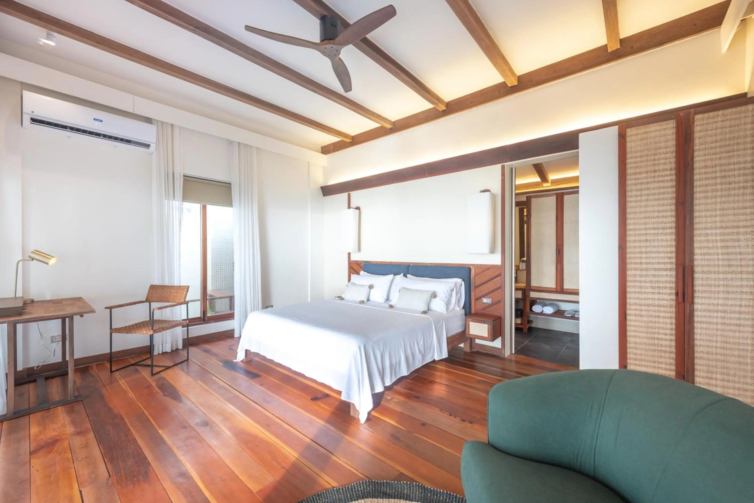 Bed in L'Osteria Luxe Beachfront B&B