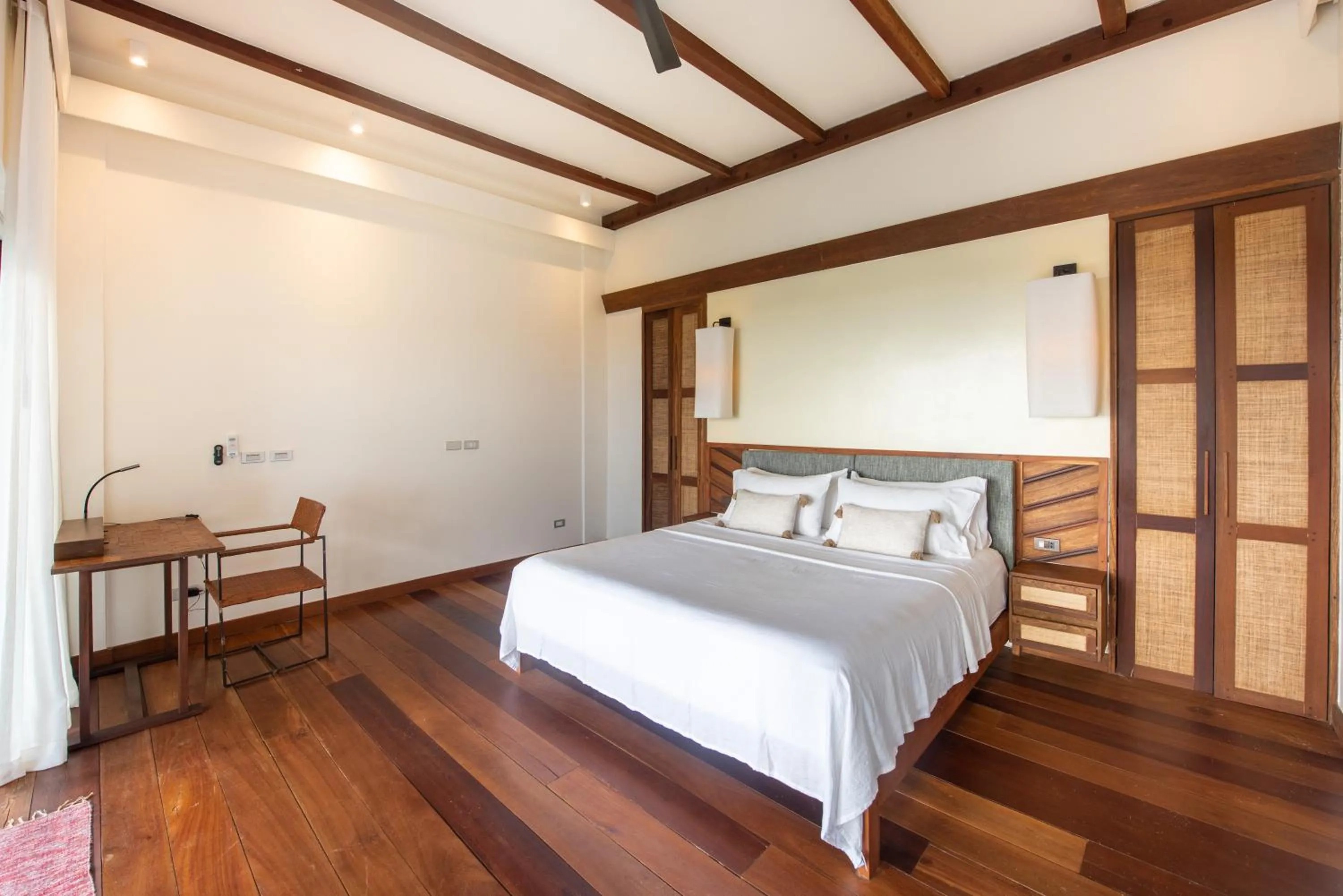 Bed in L'Osteria Luxe Beachfront B&B
