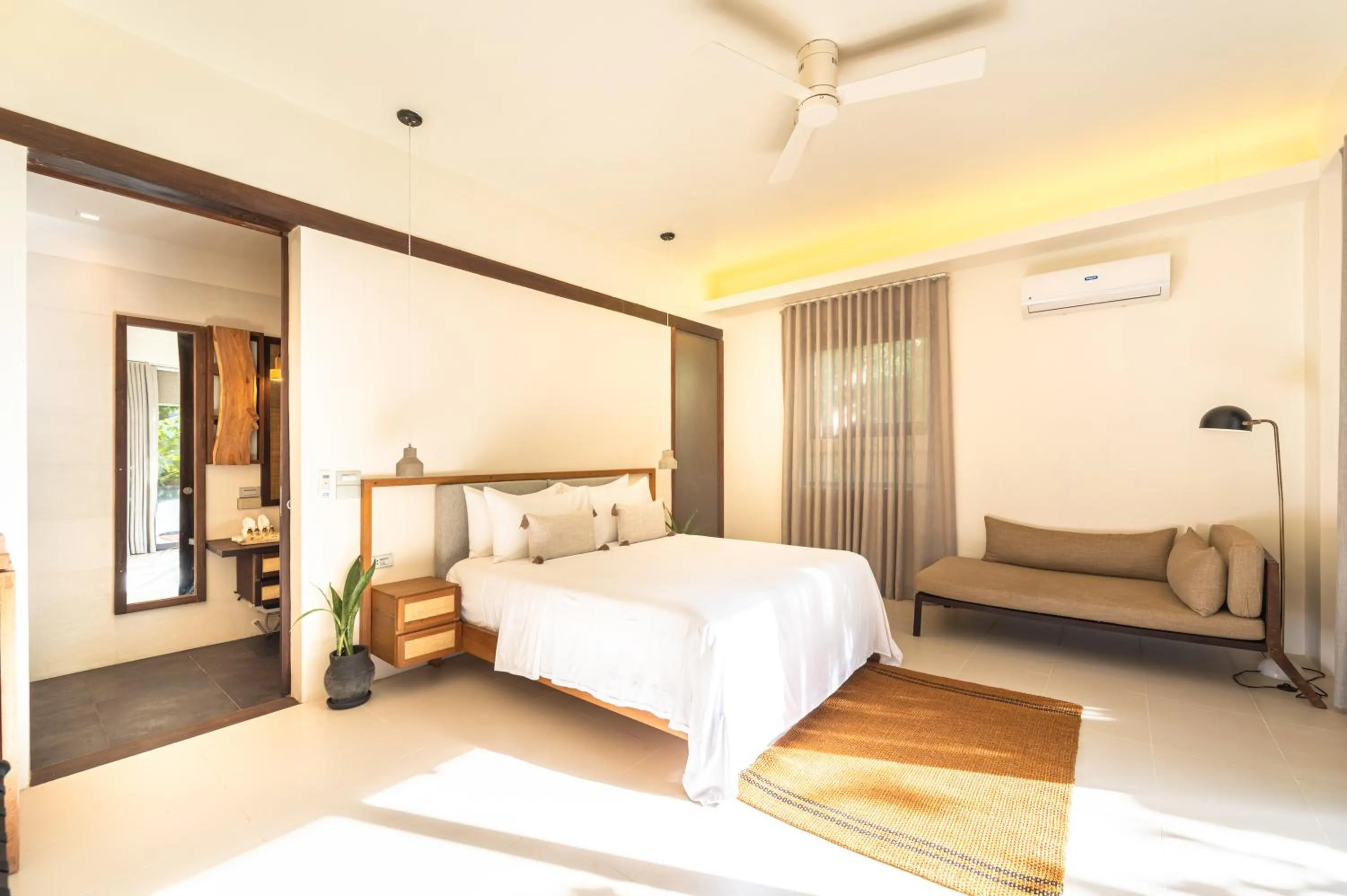 Bed in L'Osteria Luxe Beachfront B&B