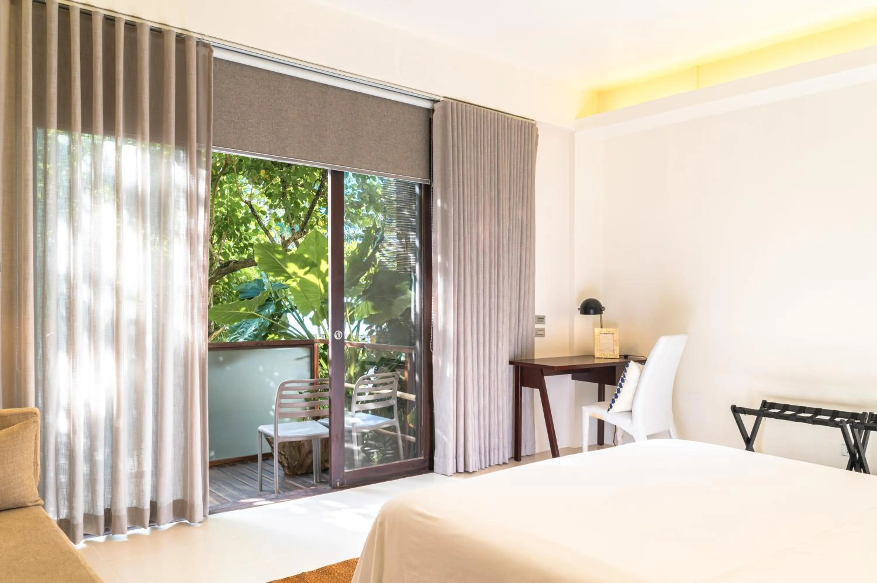 Bed in L'Osteria Luxe Beachfront B&B