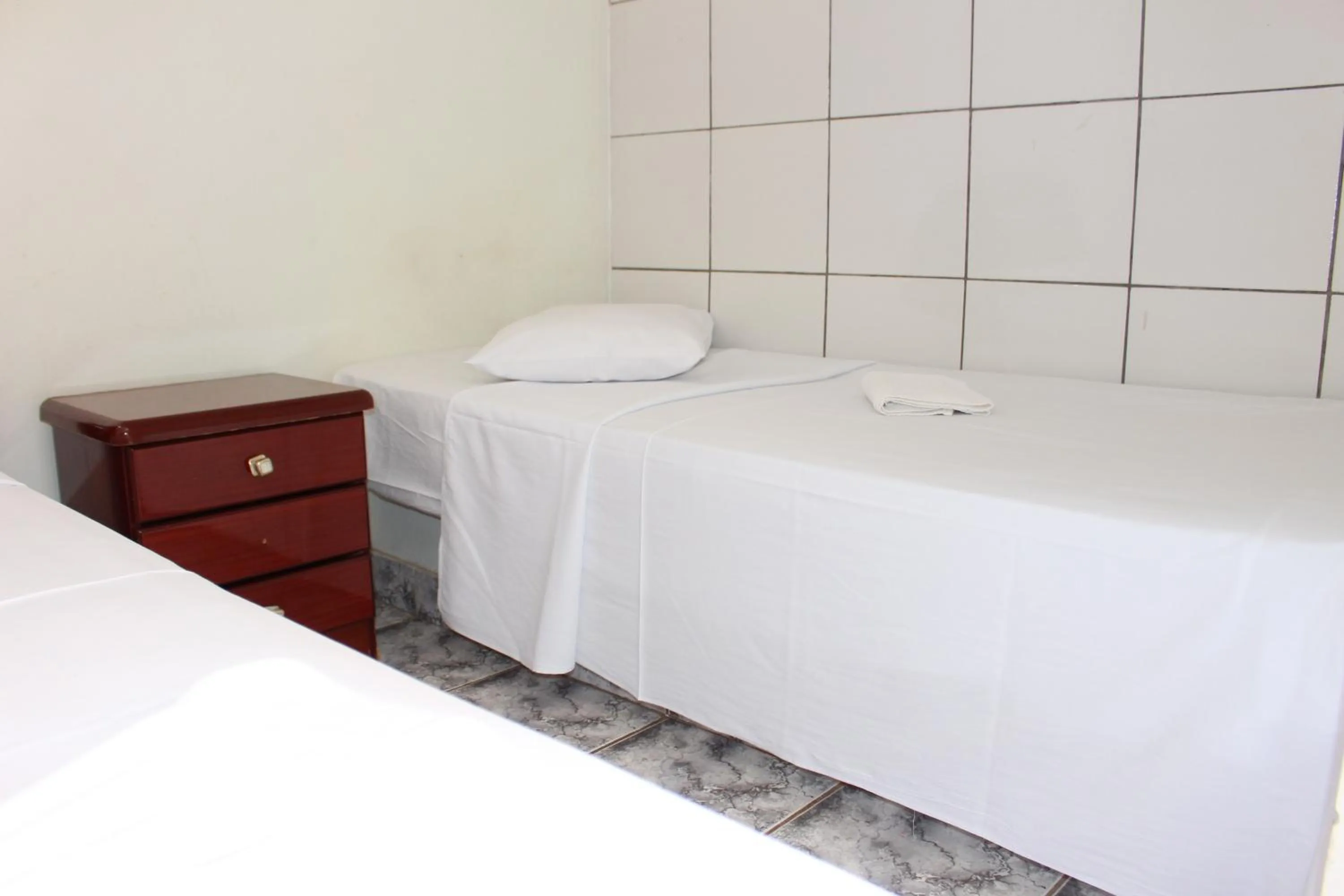 Bed in Bica Pau Hotel