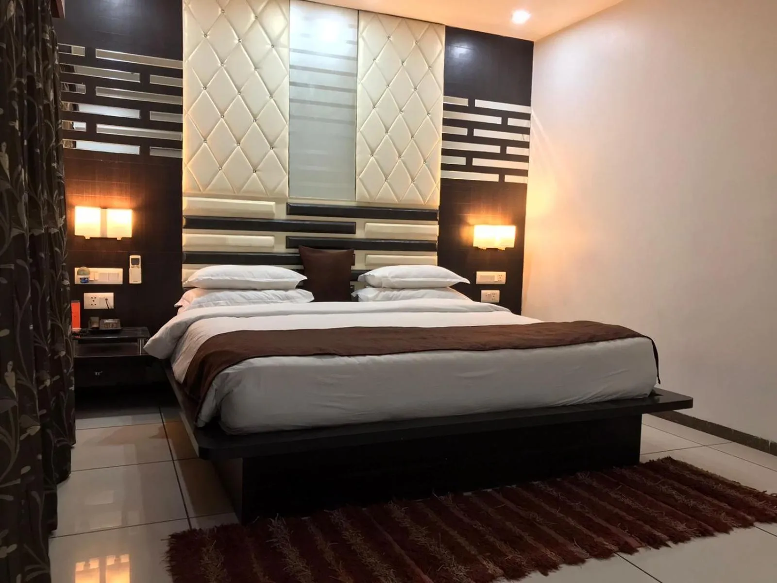 Bed in Pearl Hotel & Banquets Ahmedabad
