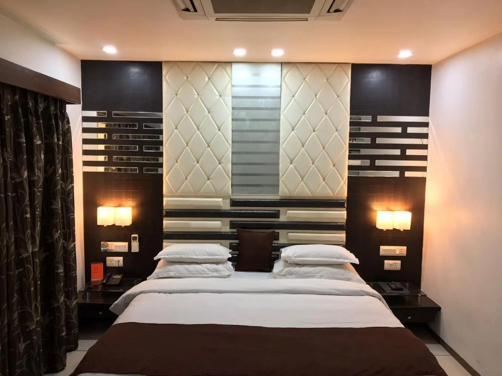 Bed in Pearl Hotel & Banquets Ahmedabad