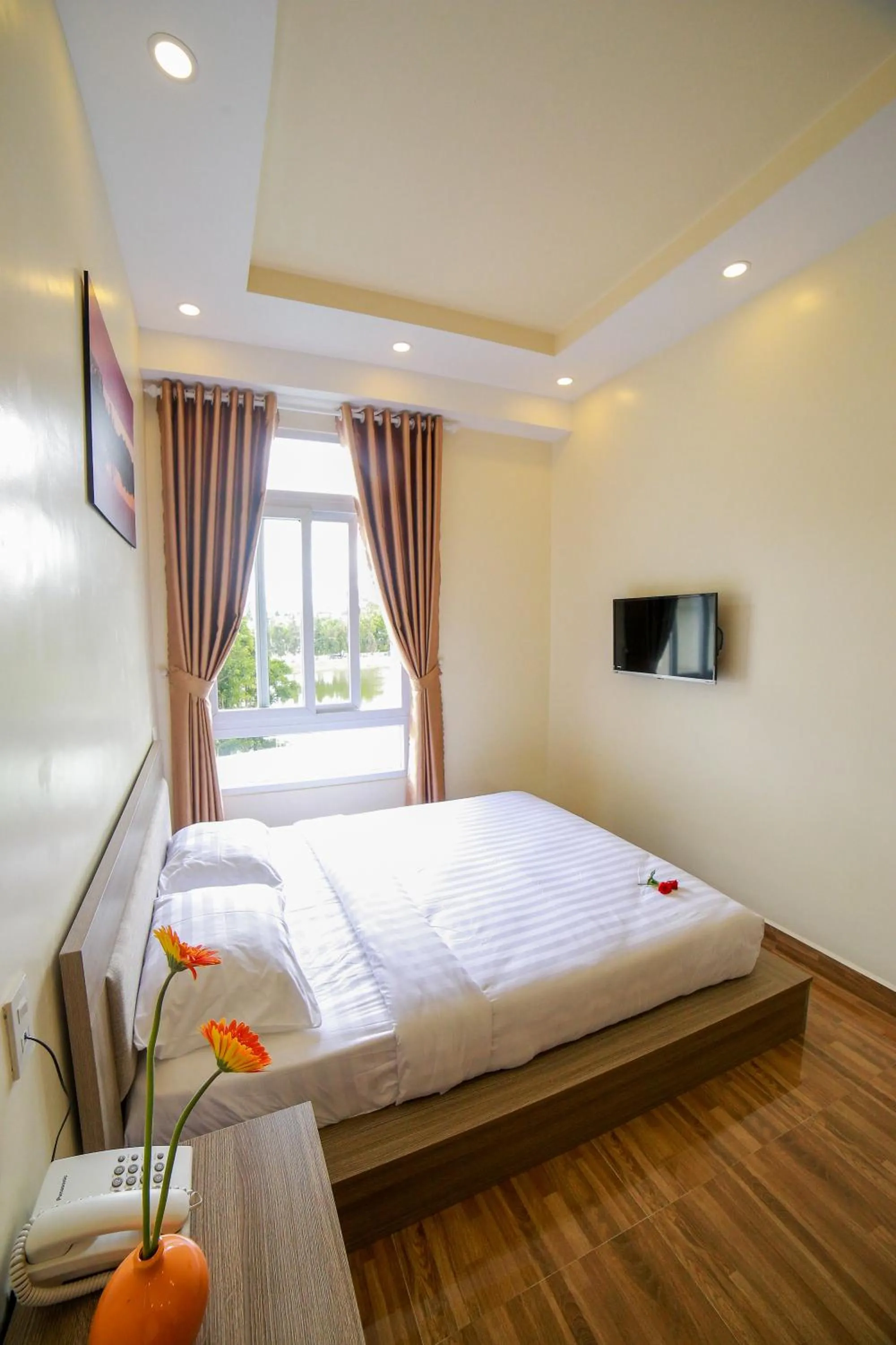 Photo of the whole room, Bed in Nhật Nguyên Hotel