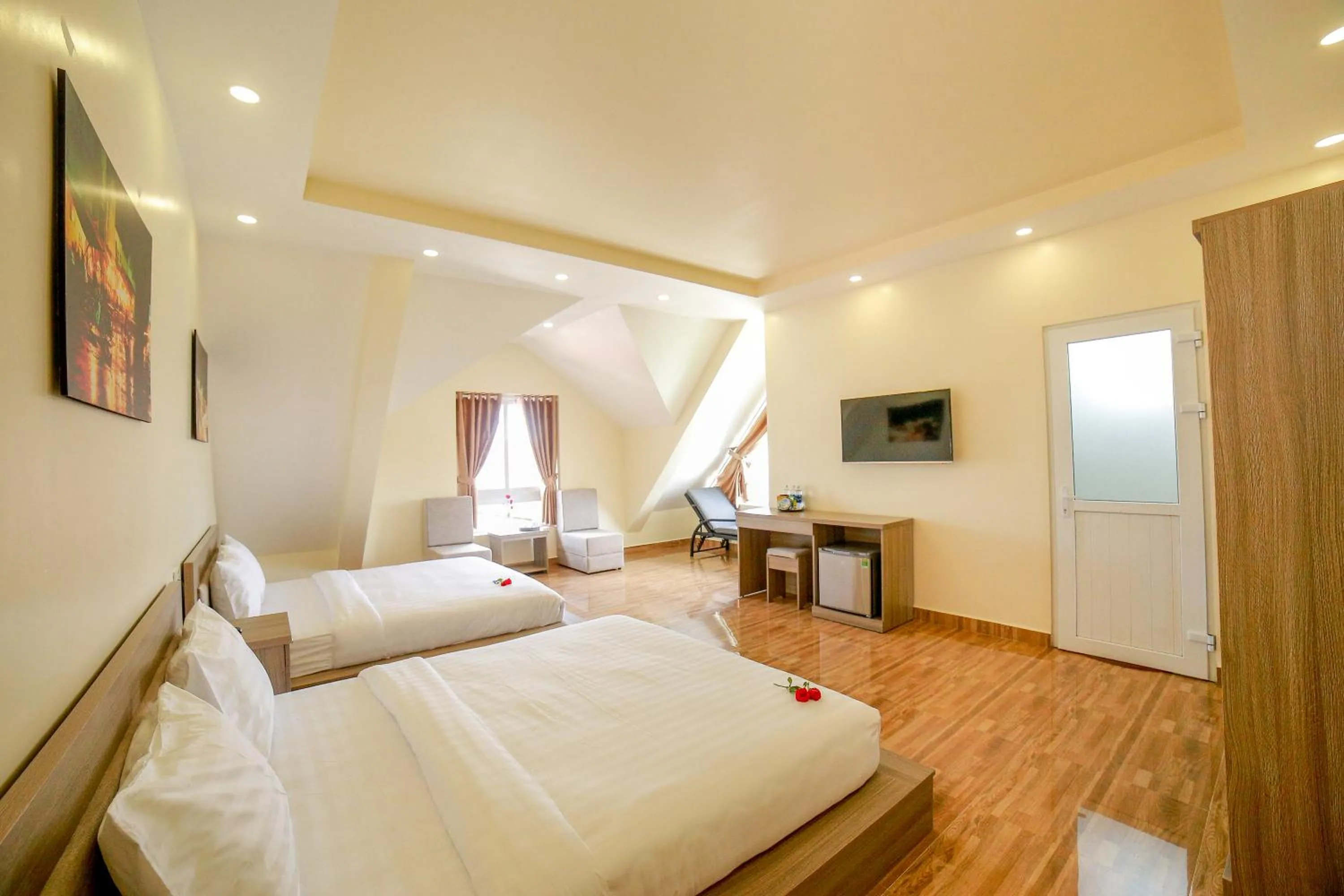 Photo of the whole room, Bed in Nhật Nguyên Hotel
