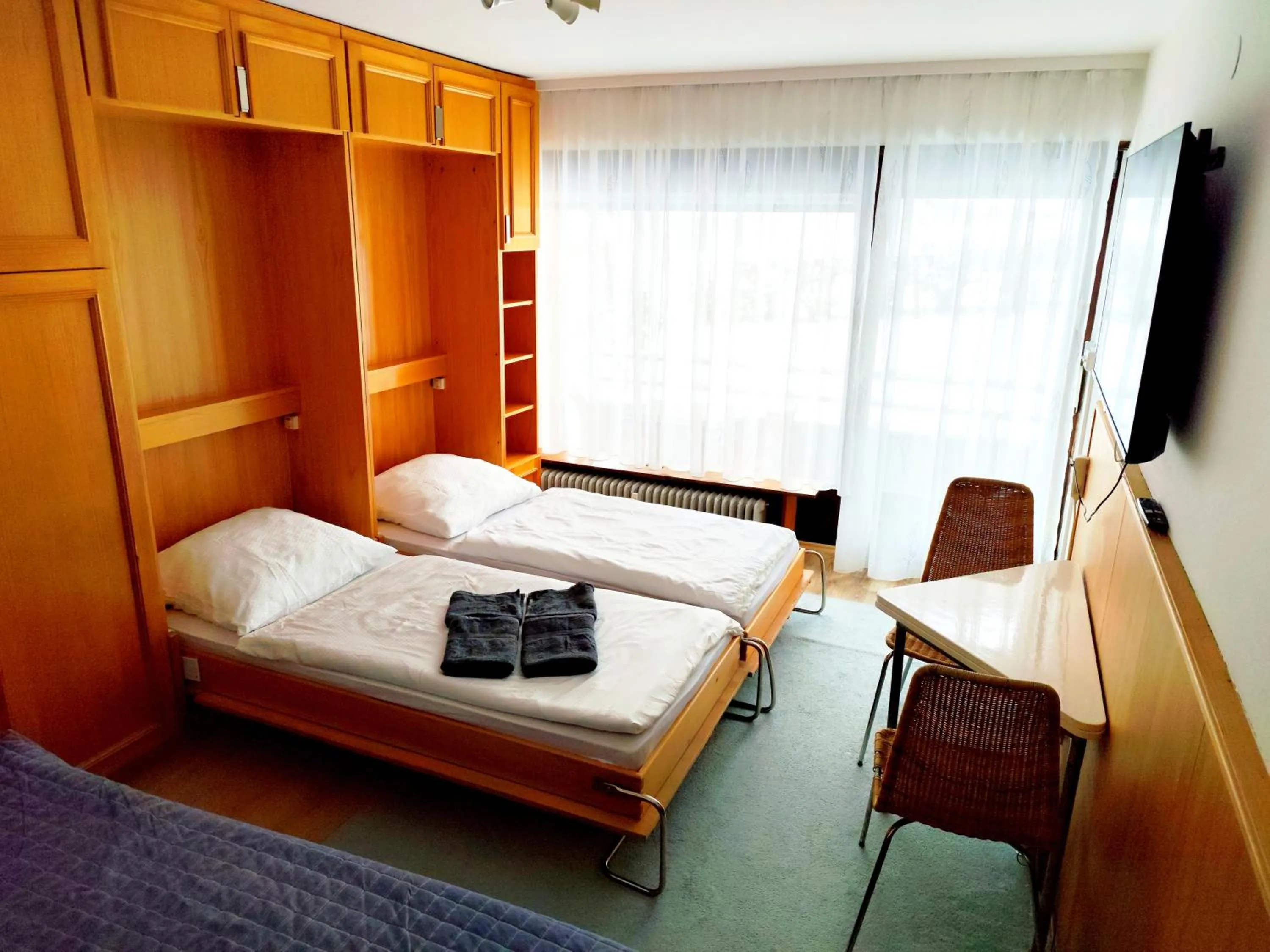 Bed in Bad Gastein Holiday Apartments
