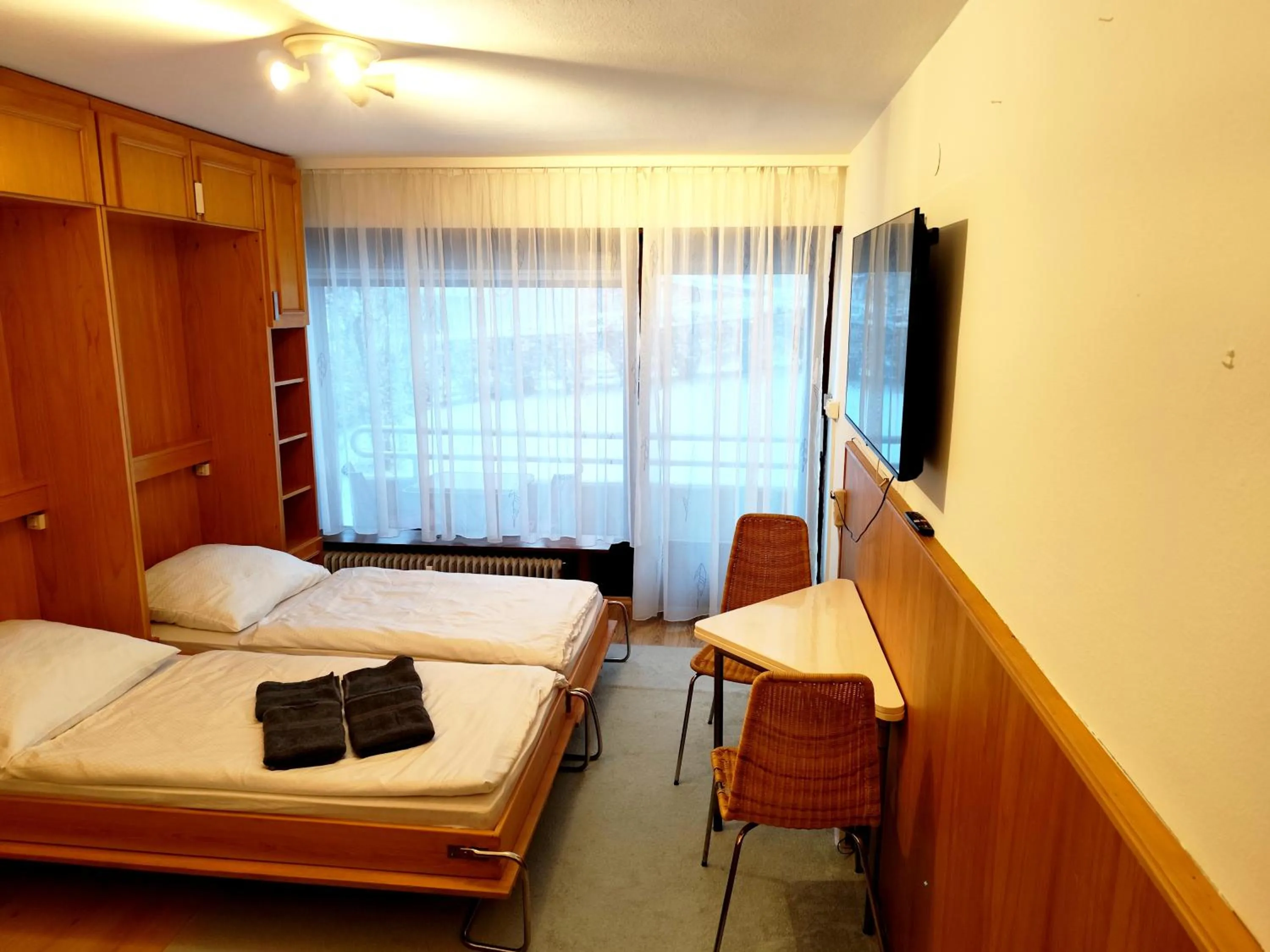 Bed in Bad Gastein Holiday Apartments