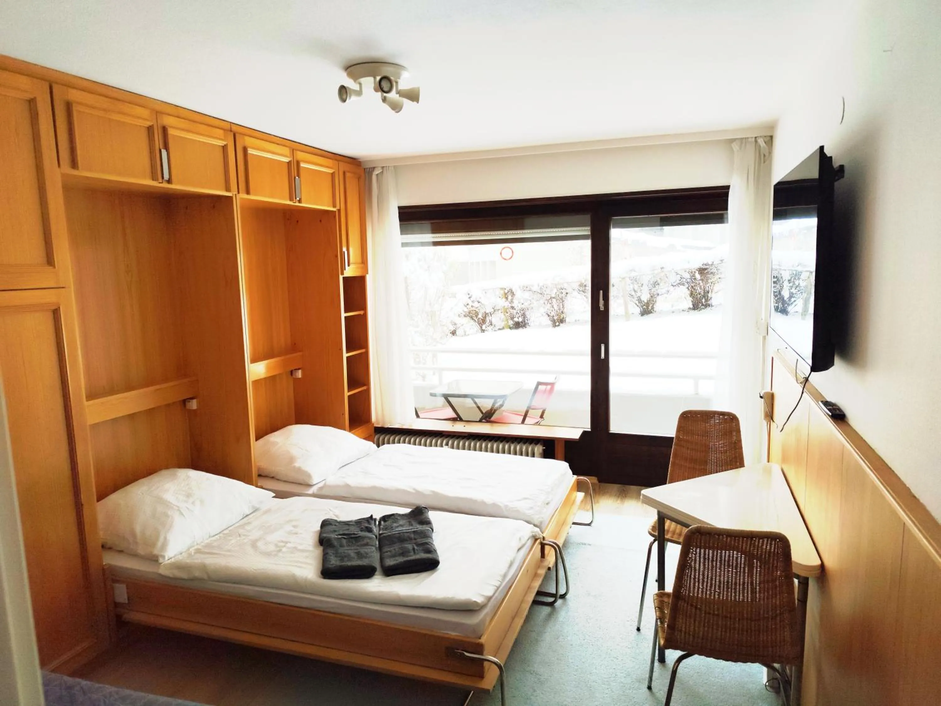 Bed in Bad Gastein Holiday Apartments
