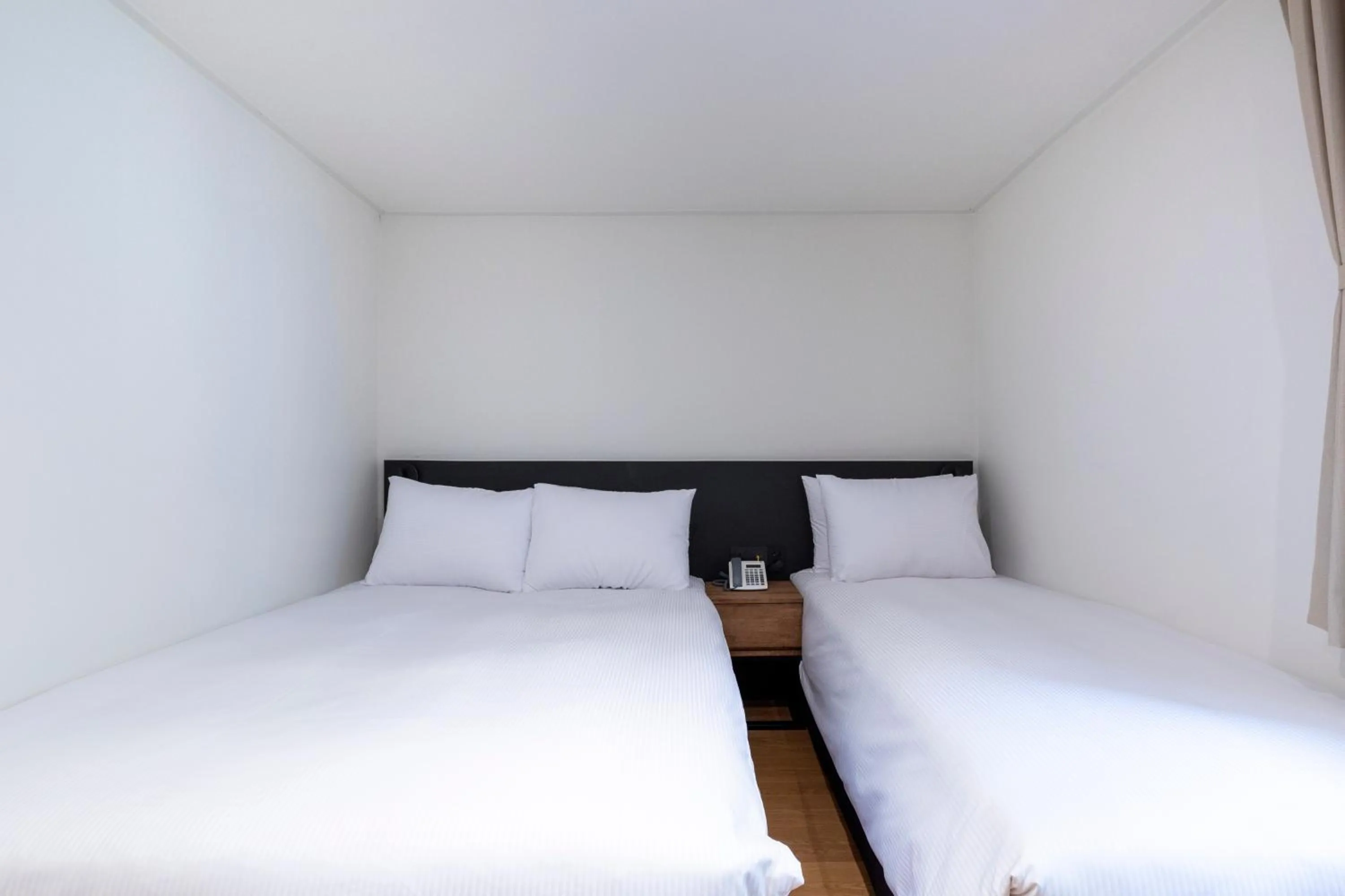 Bed in Hotel Firststay Myeongdong
