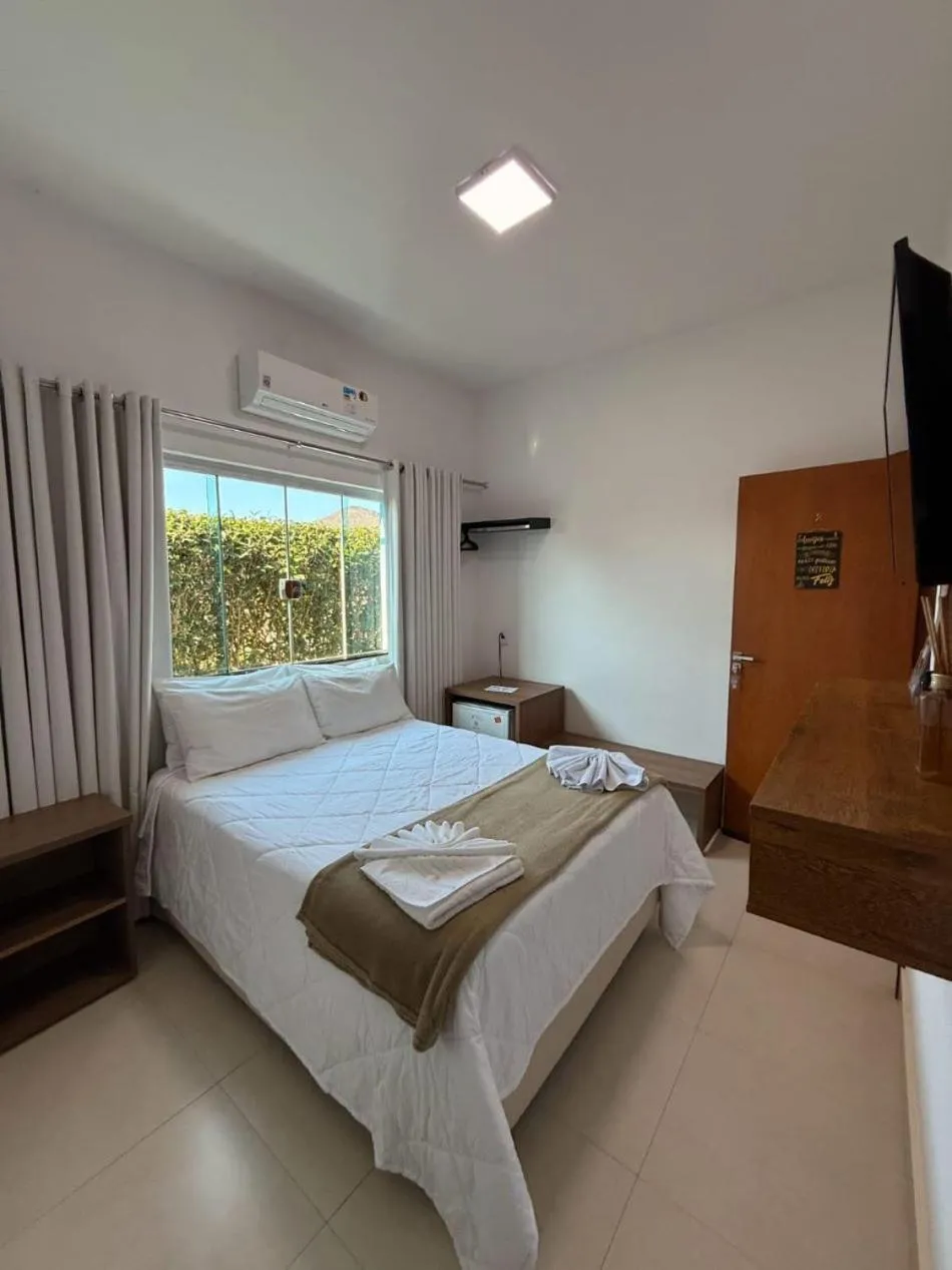 Bed in POUSADA RECANTO DAS VERTENTES