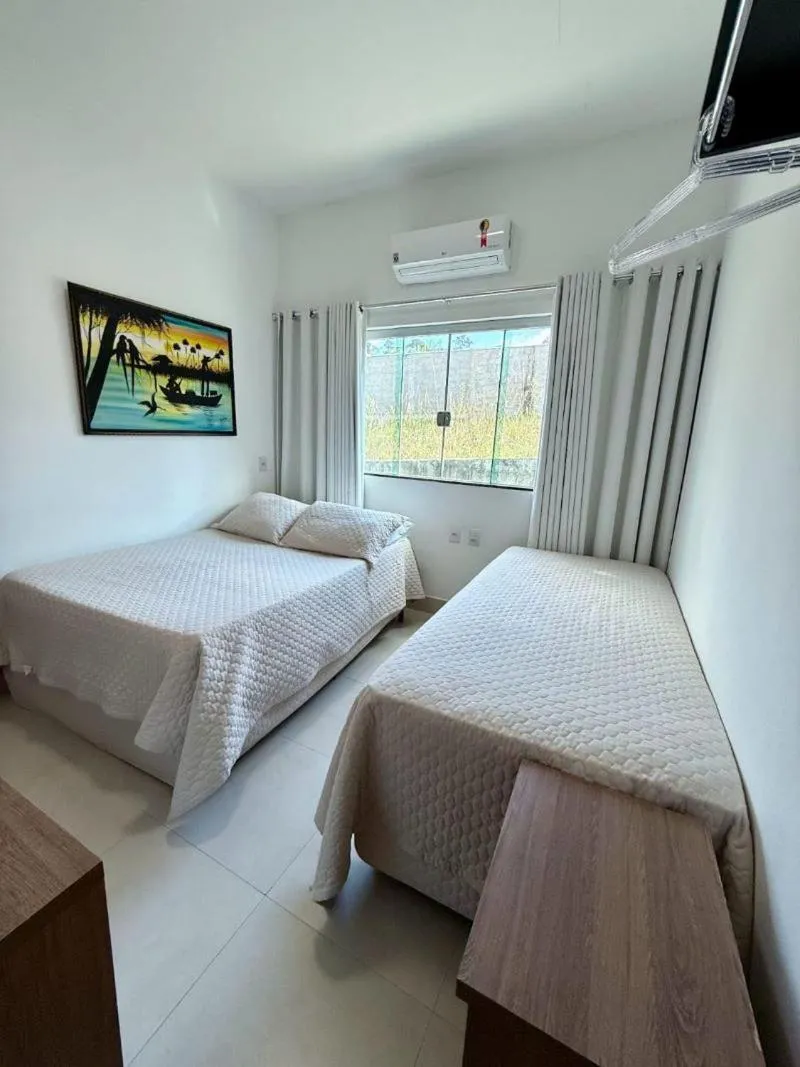 Bed in POUSADA RECANTO DAS VERTENTES