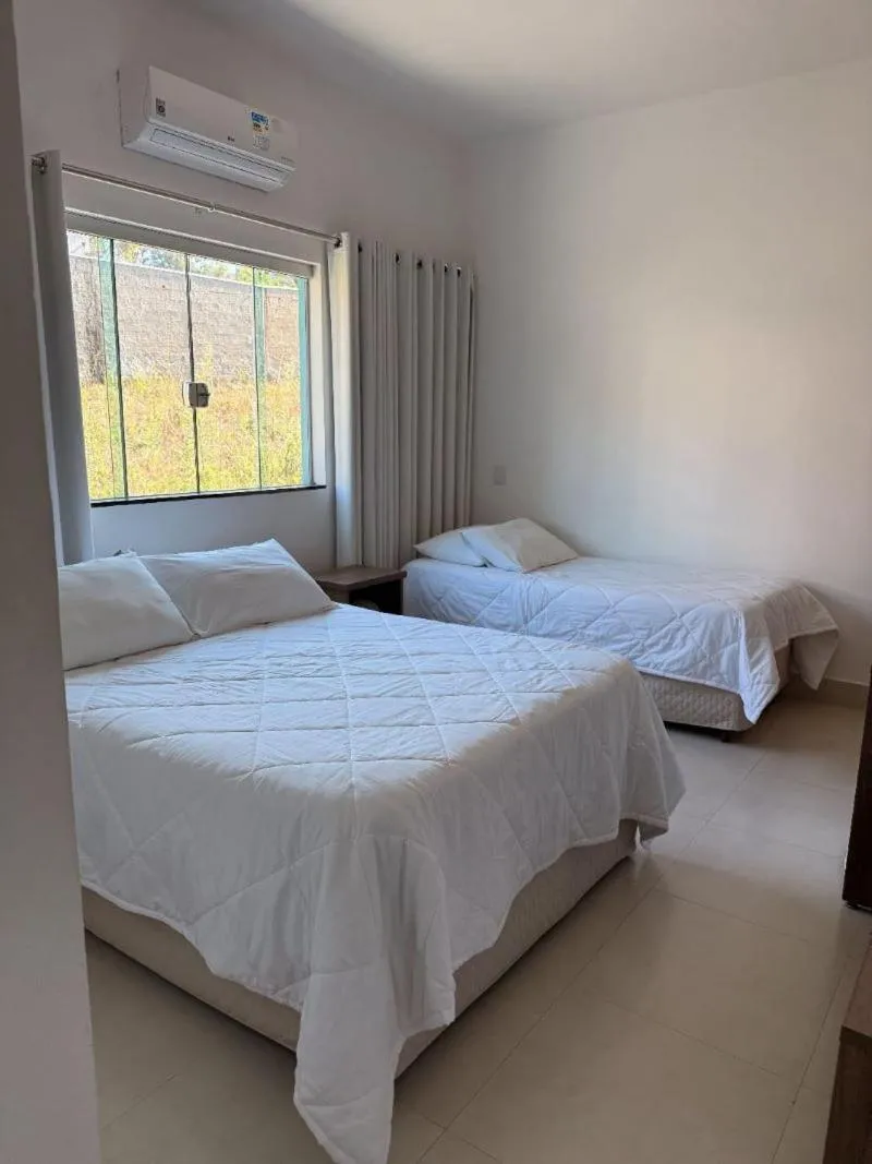 Bed in POUSADA RECANTO DAS VERTENTES