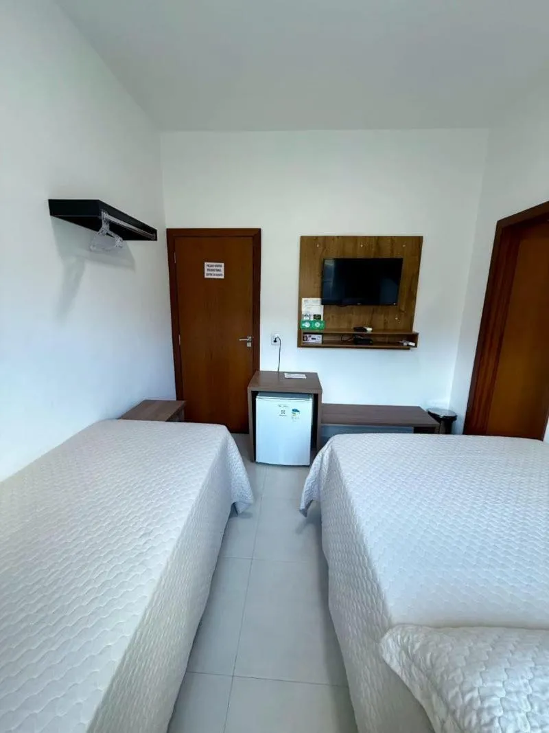Bed in POUSADA RECANTO DAS VERTENTES