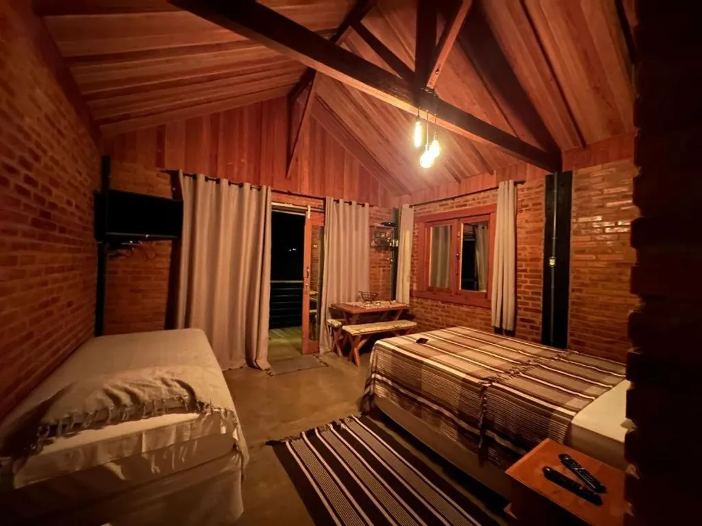 Bed in Pousada Café da Mata