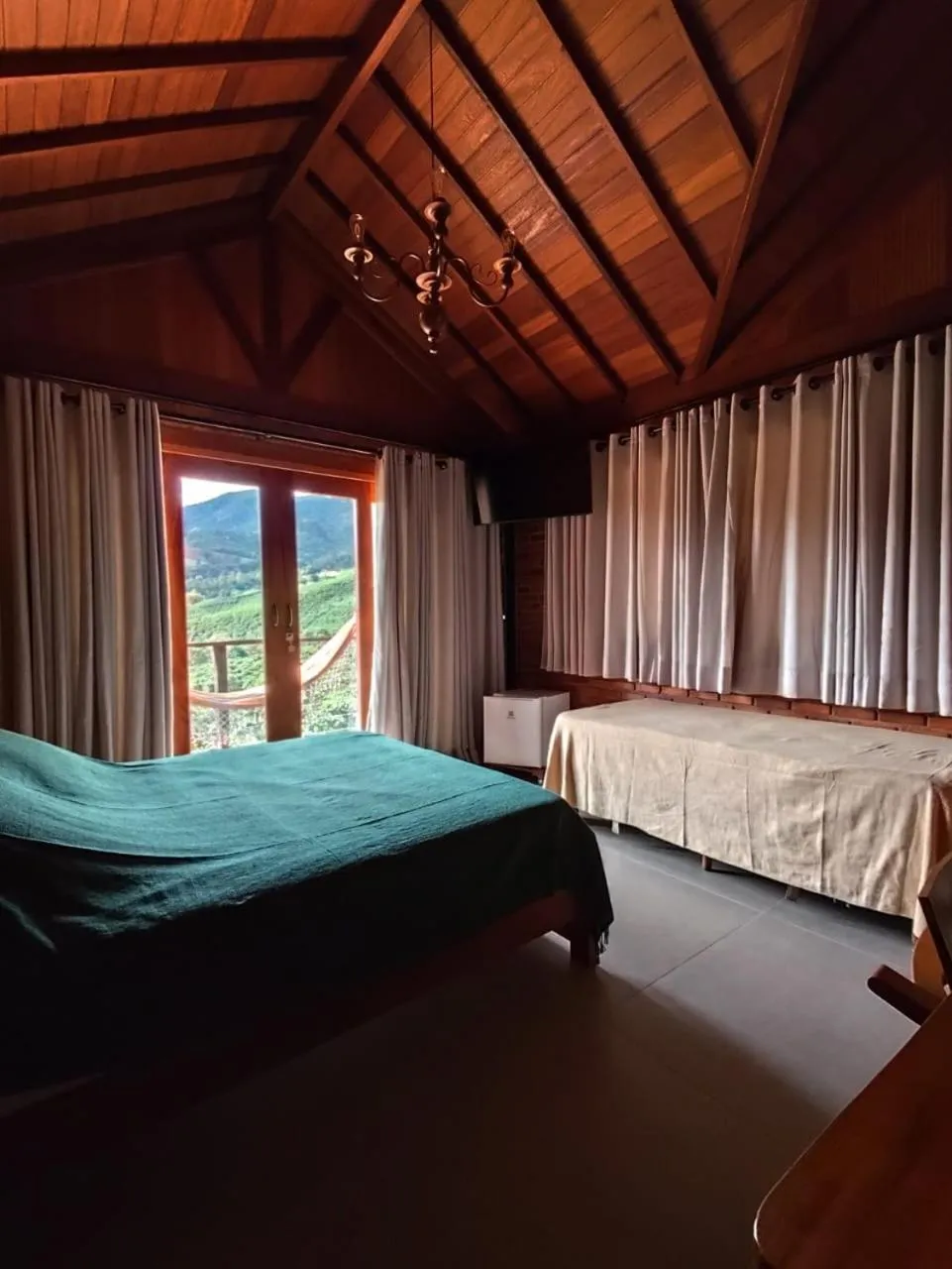 Bed in Pousada Café da Mata