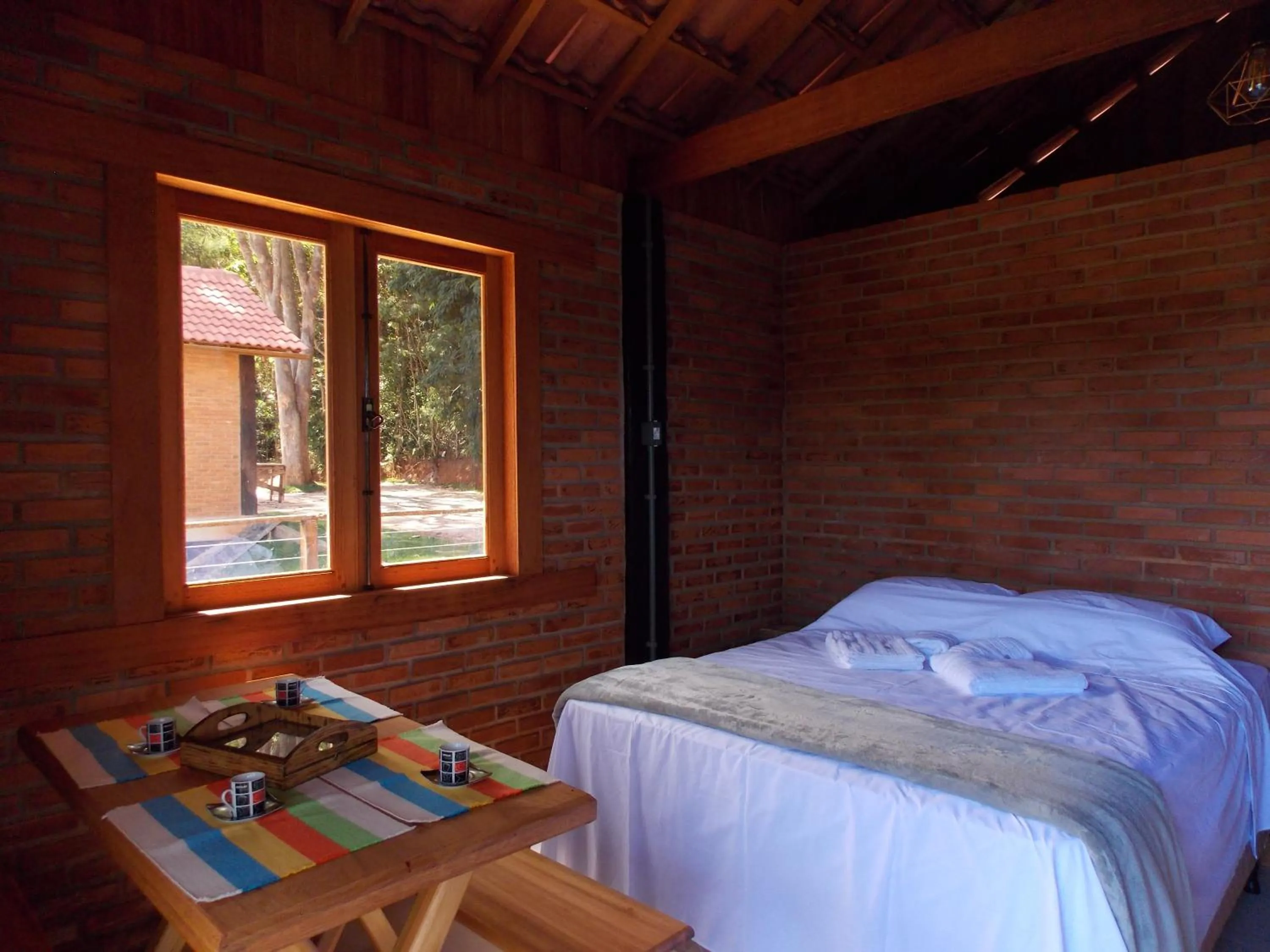 Bed in Pousada Café da Mata