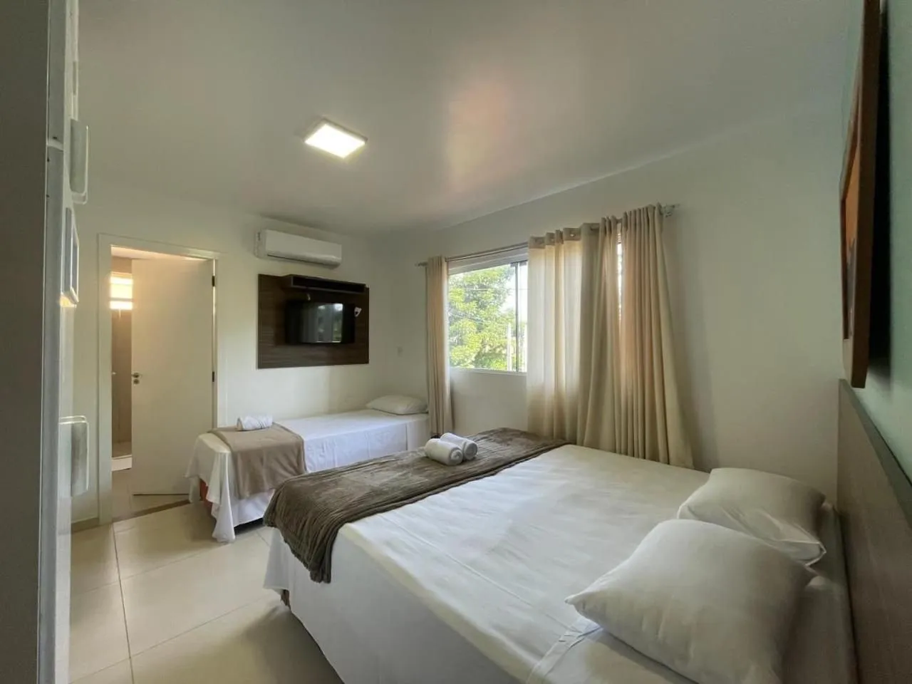 Bed in Pousada Bernúncia