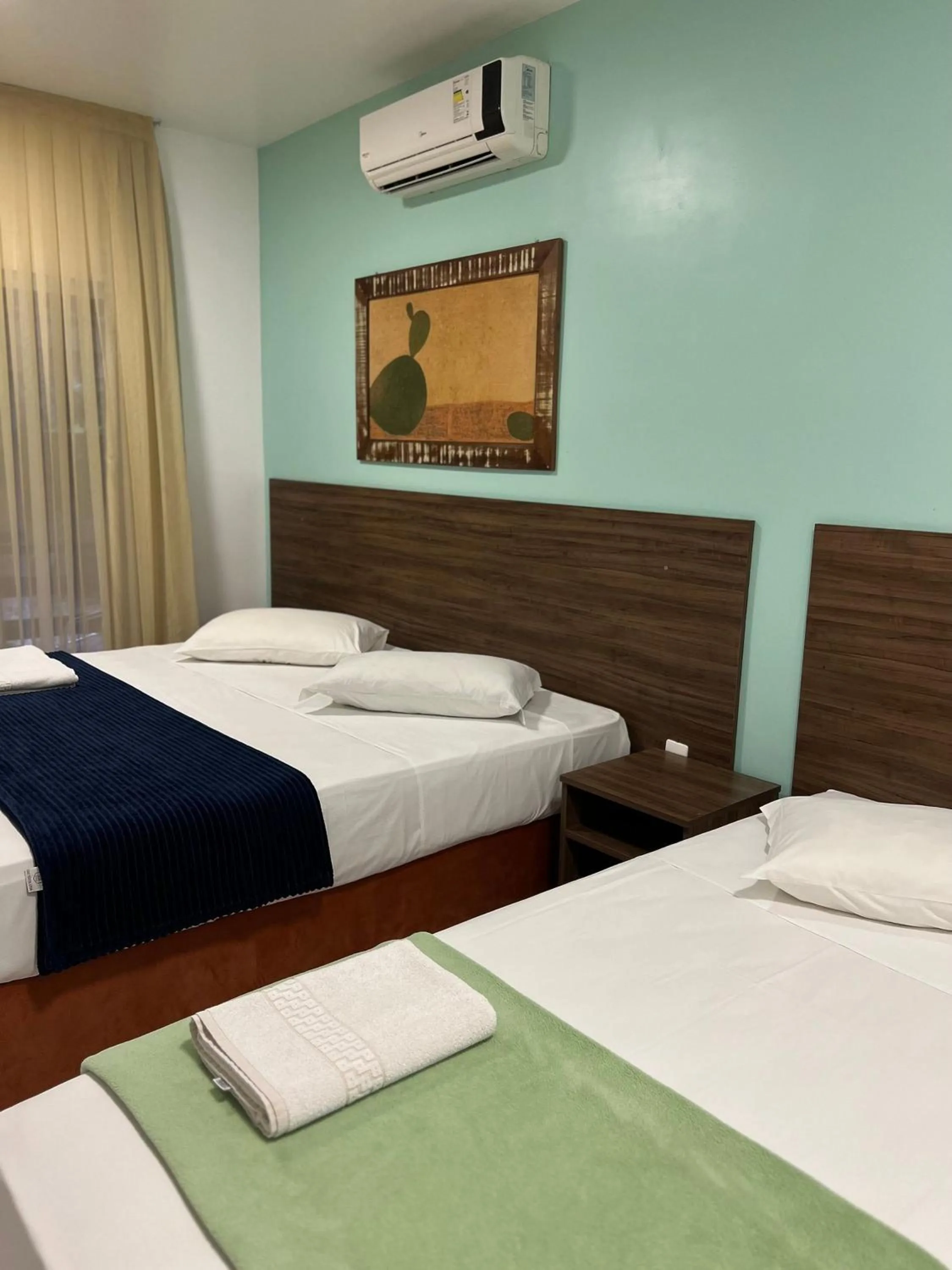 Bed in Pousada Bernúncia - Com café da Manhã, próximo a Praia Grande