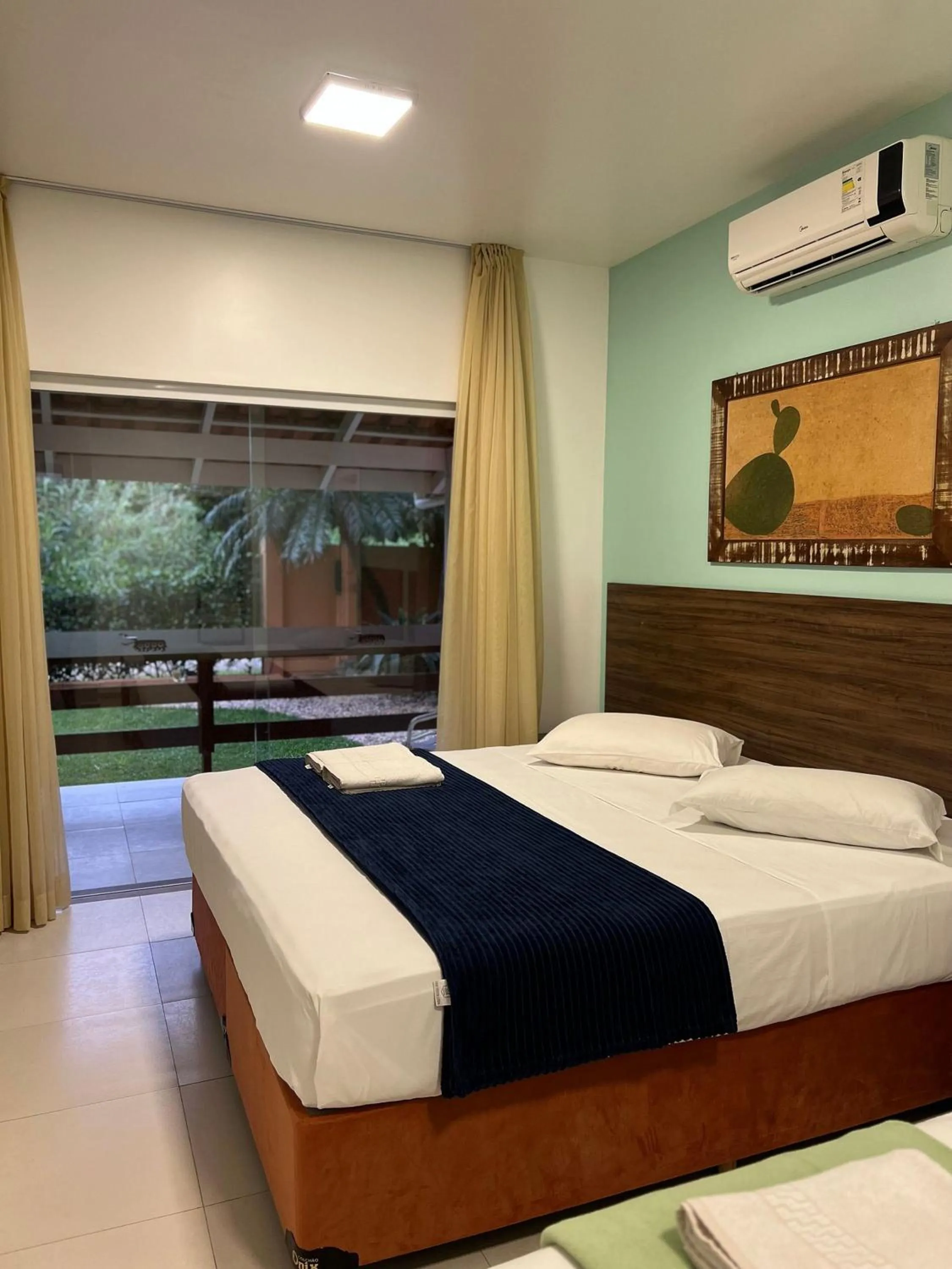 Bed in Pousada Bernúncia - Com café da Manhã, próximo a Praia Grande