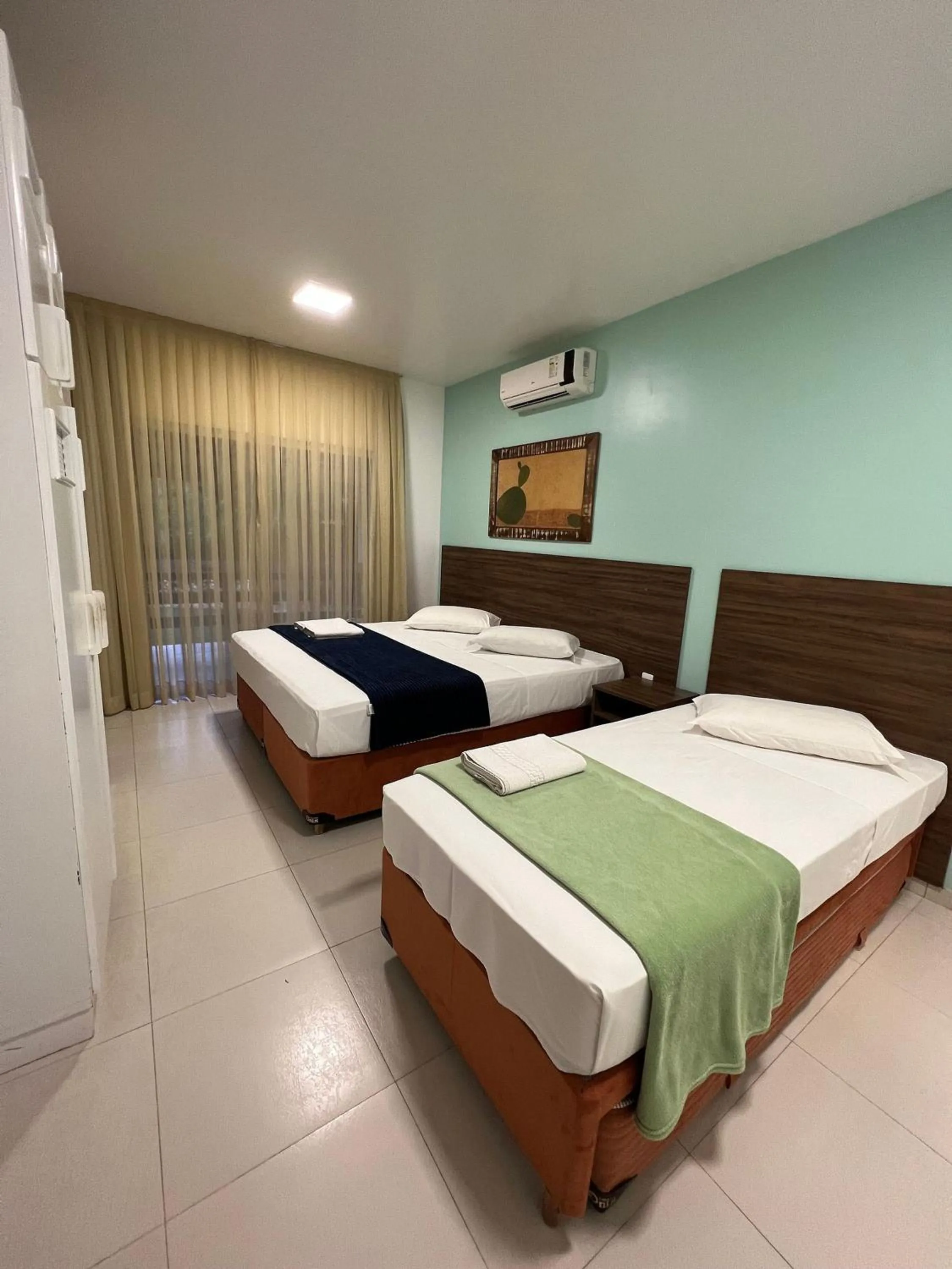 Bed in Pousada Bernúncia - Com café da Manhã, próximo a Praia Grande