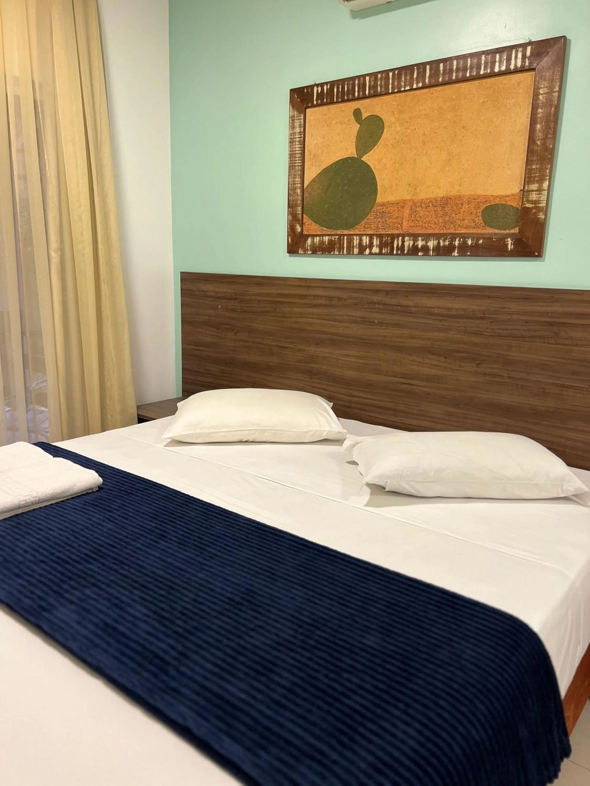 Bed in Pousada Bernúncia - Com café da Manhã, próximo a Praia Grande