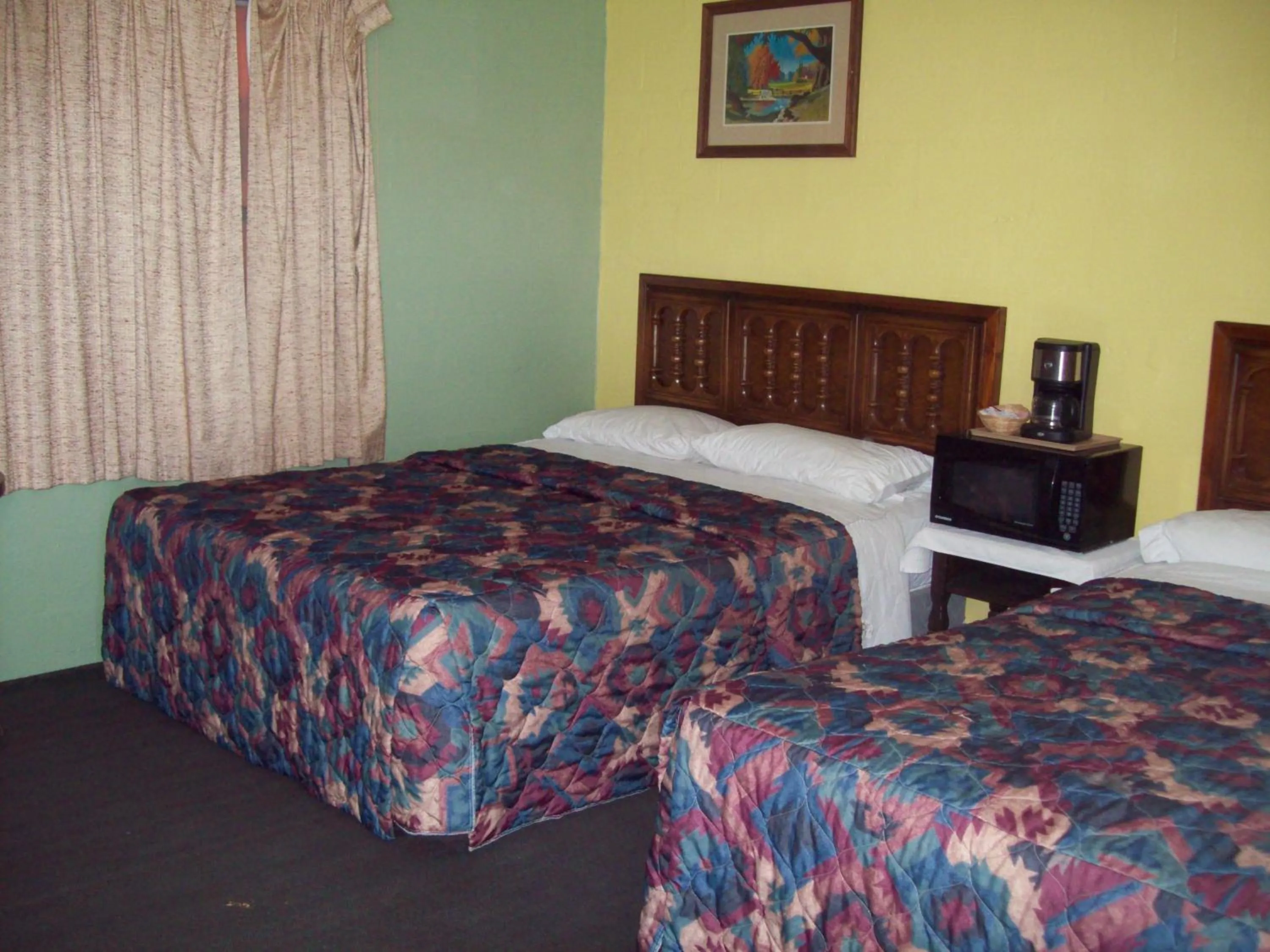 Bed in Budget Inn Sanderson