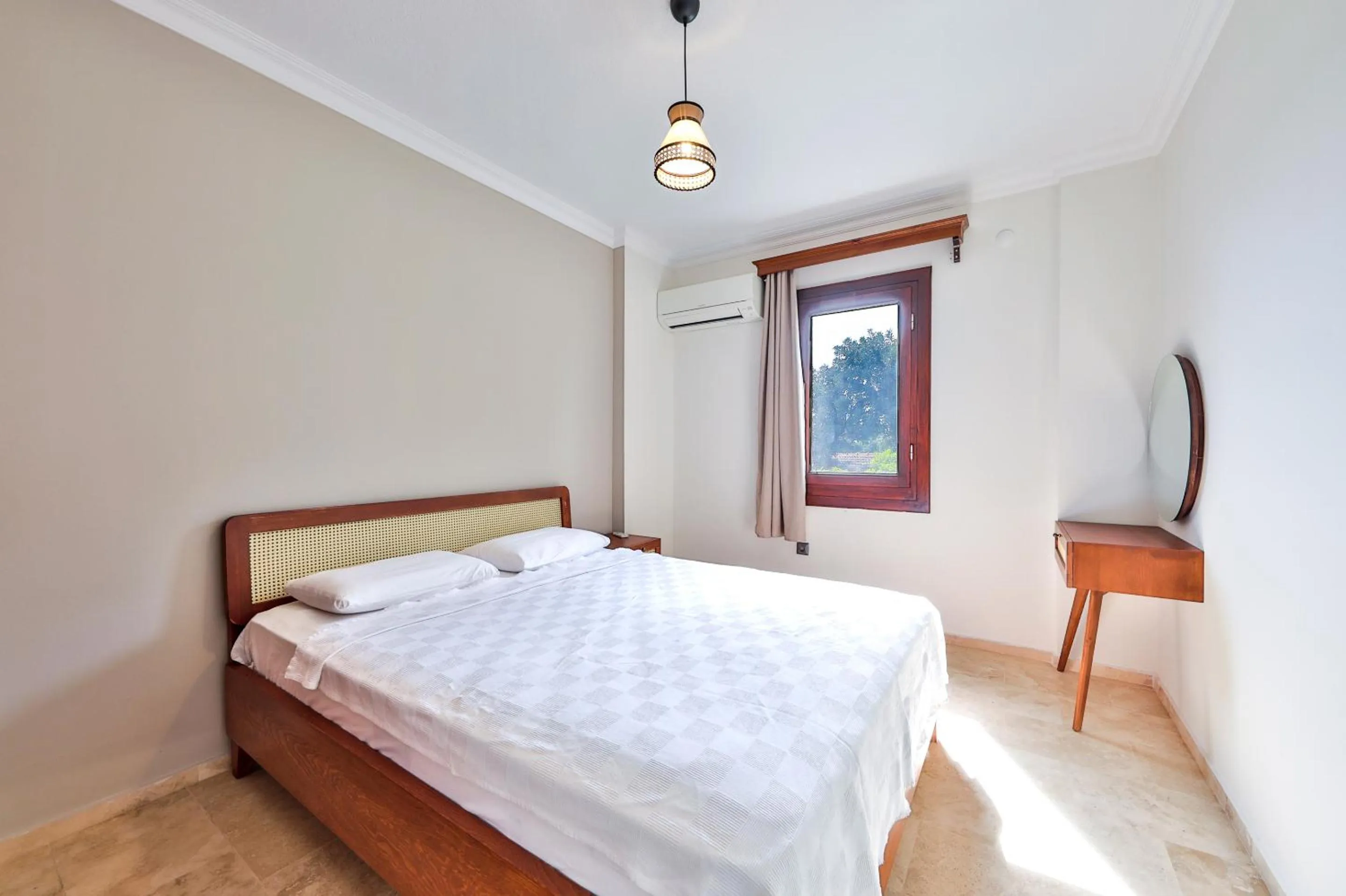 Bed in Nirvana Apartments