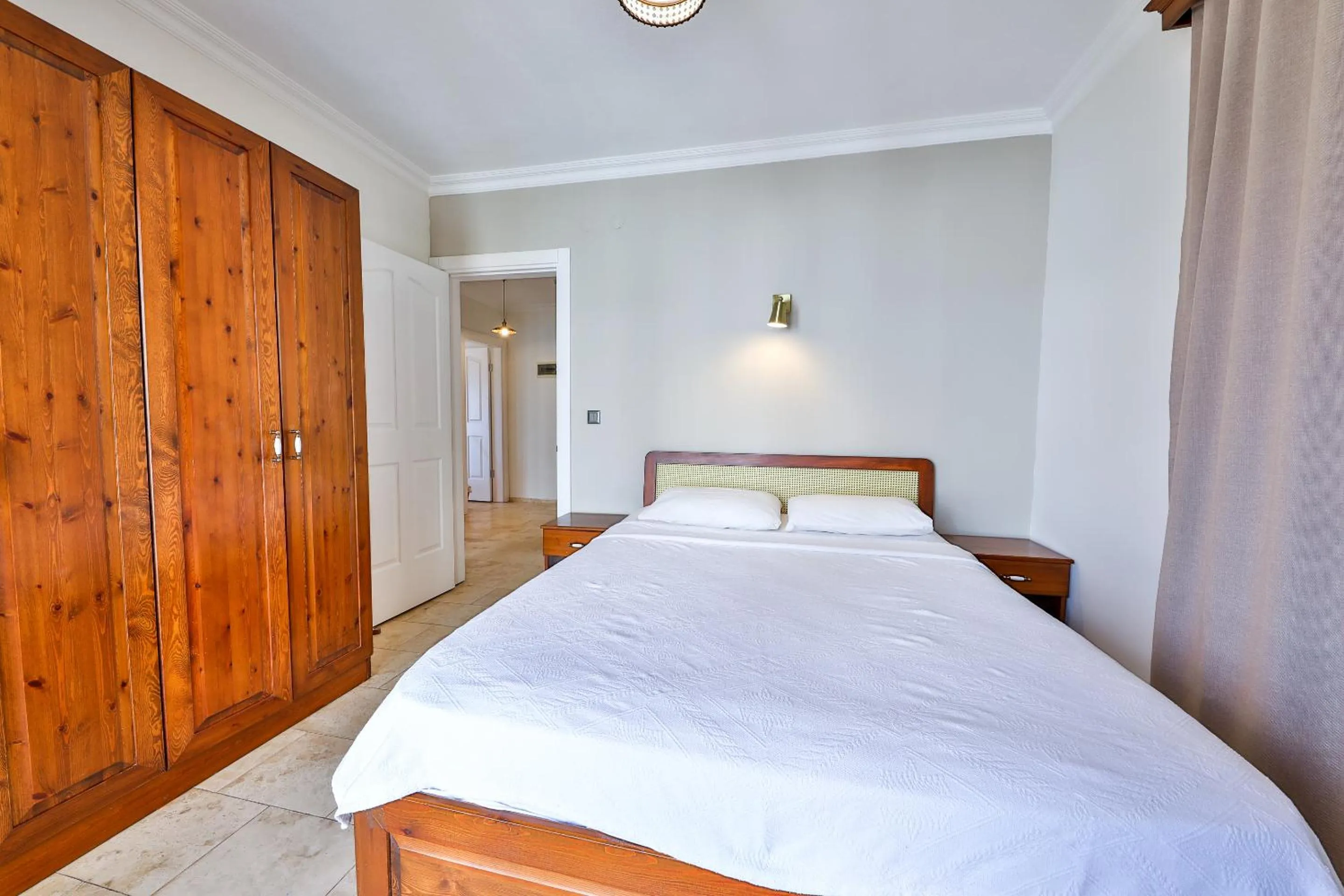 Bed in Nirvana Apartments