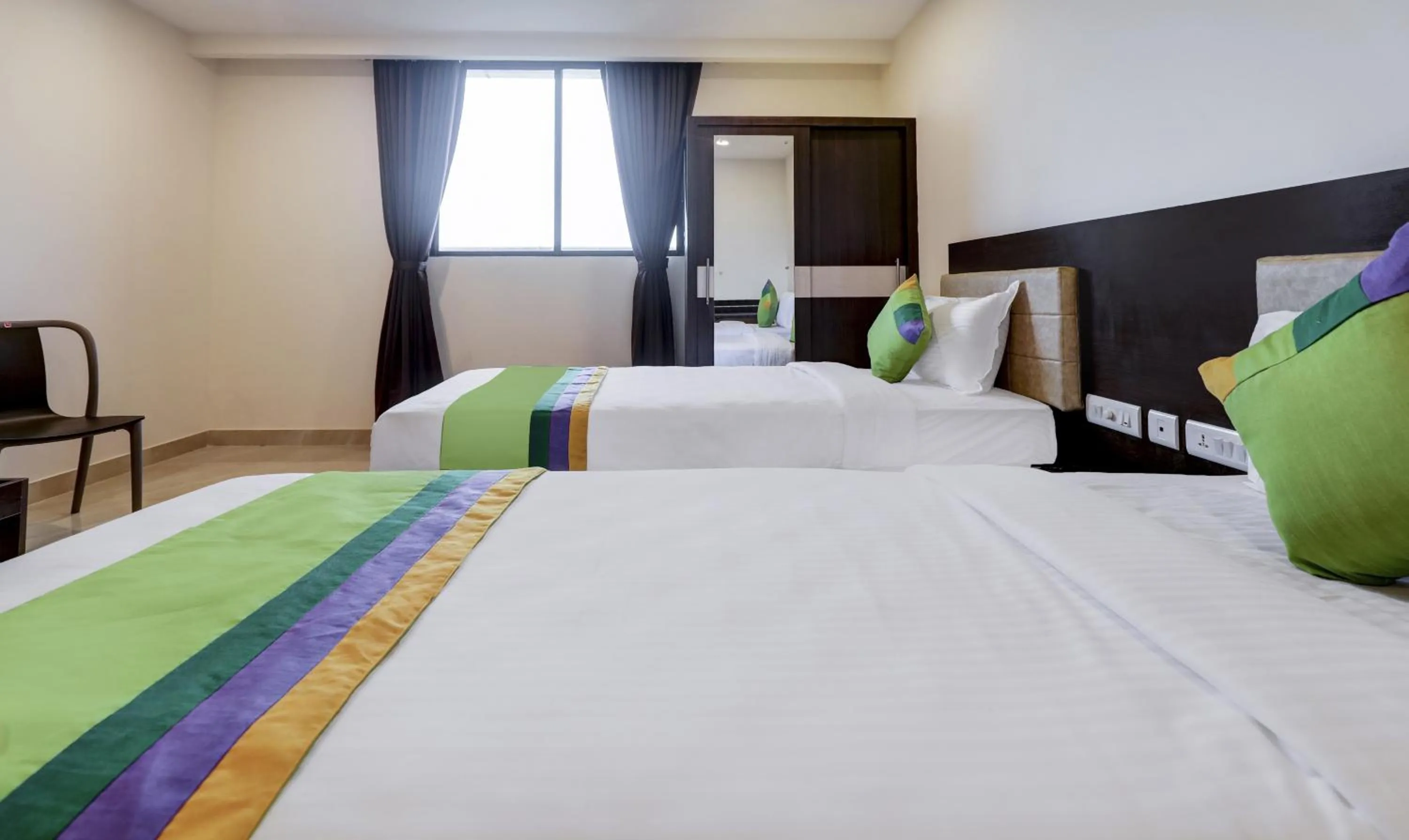 Photo of the whole room, Bed in Treebo The Horizon Kankanady