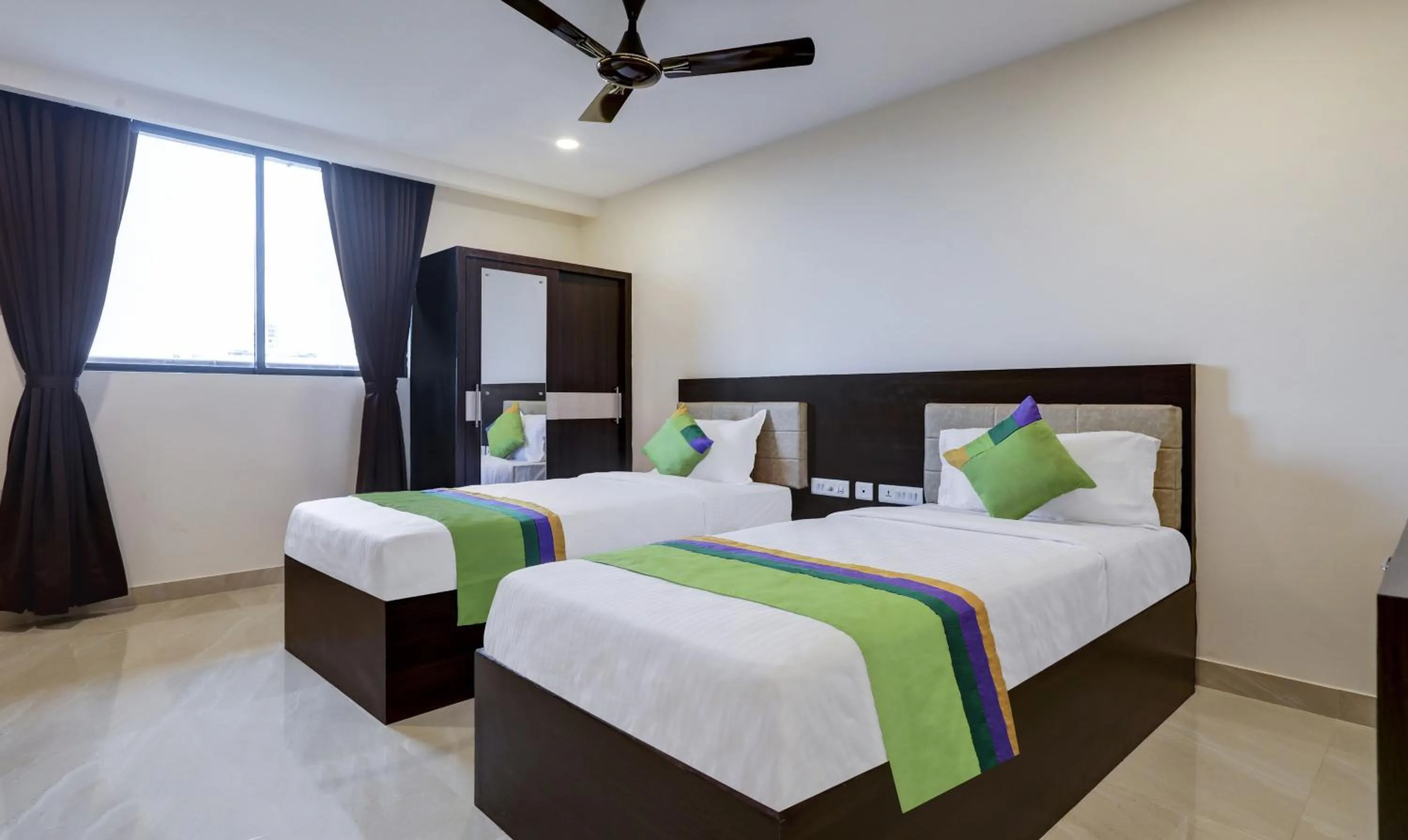 Photo of the whole room, Bed in Treebo The Horizon Kankanady