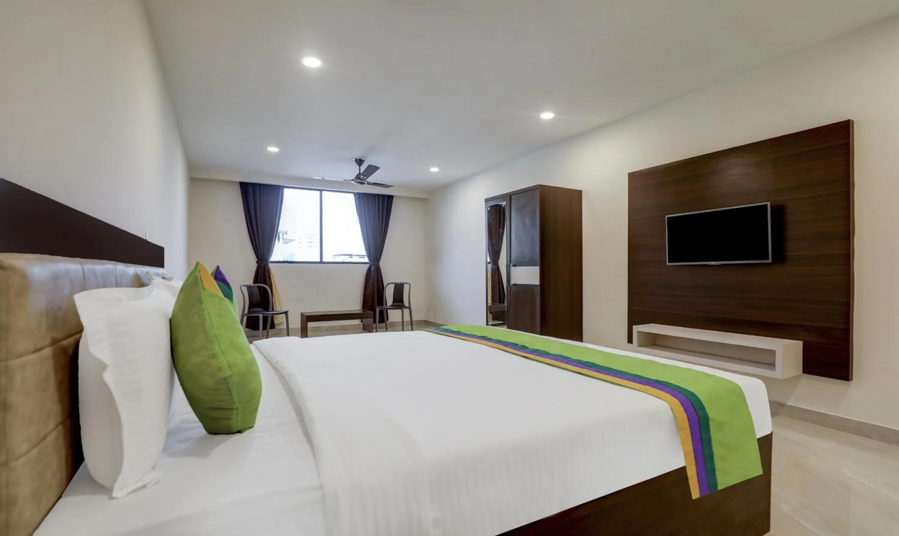 Photo of the whole room, Bed in Treebo The Horizon Kankanady