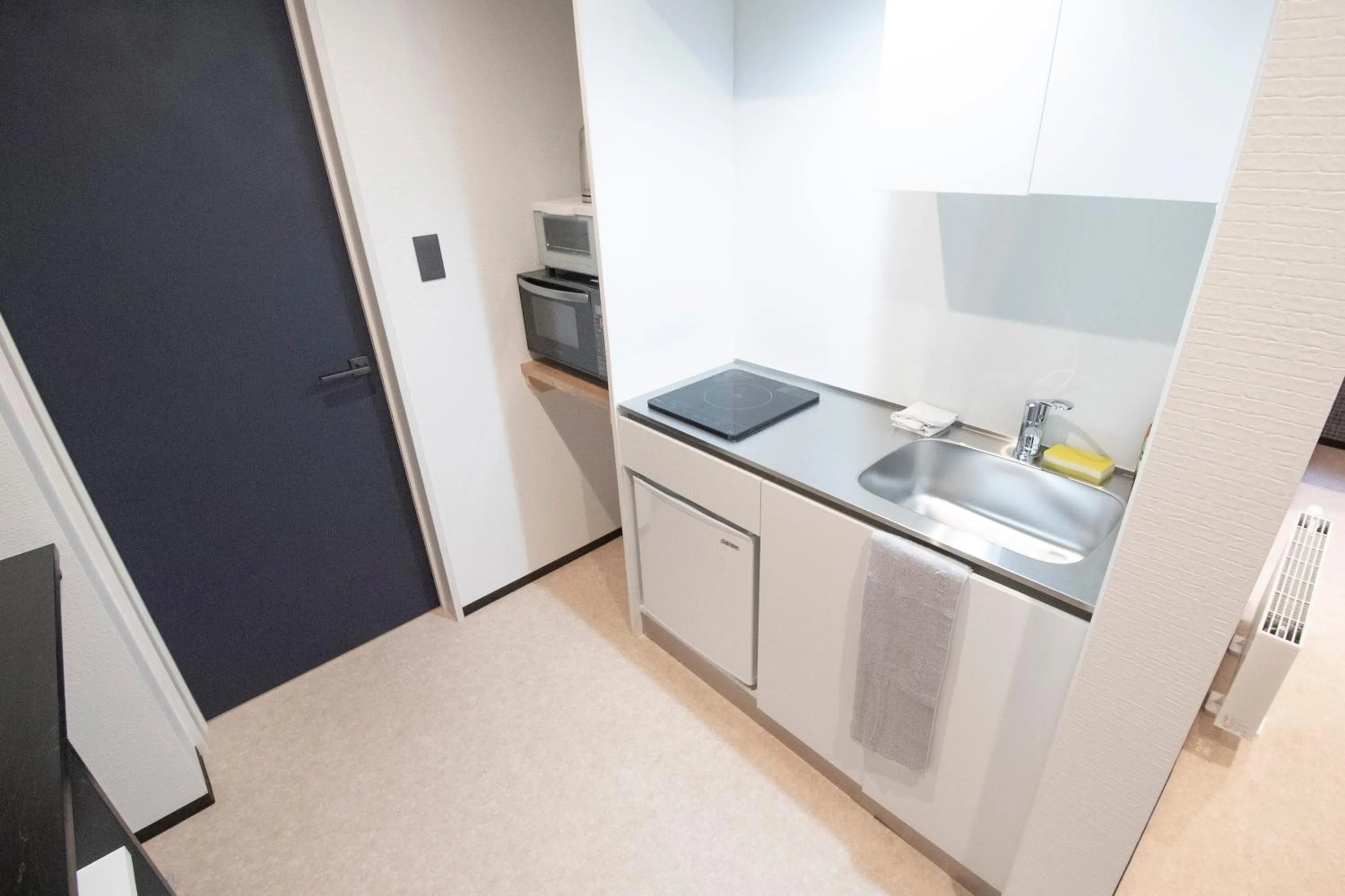 Kitchen or kitchenette in UCHI Living stay NAKAJIMA park