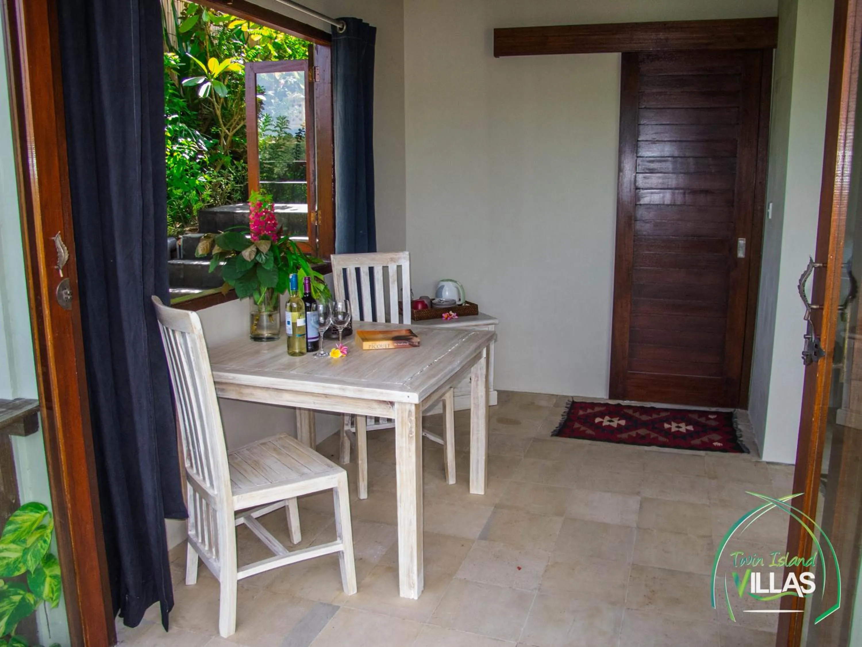 Dining area in Twin Island Villas & Dive Resort