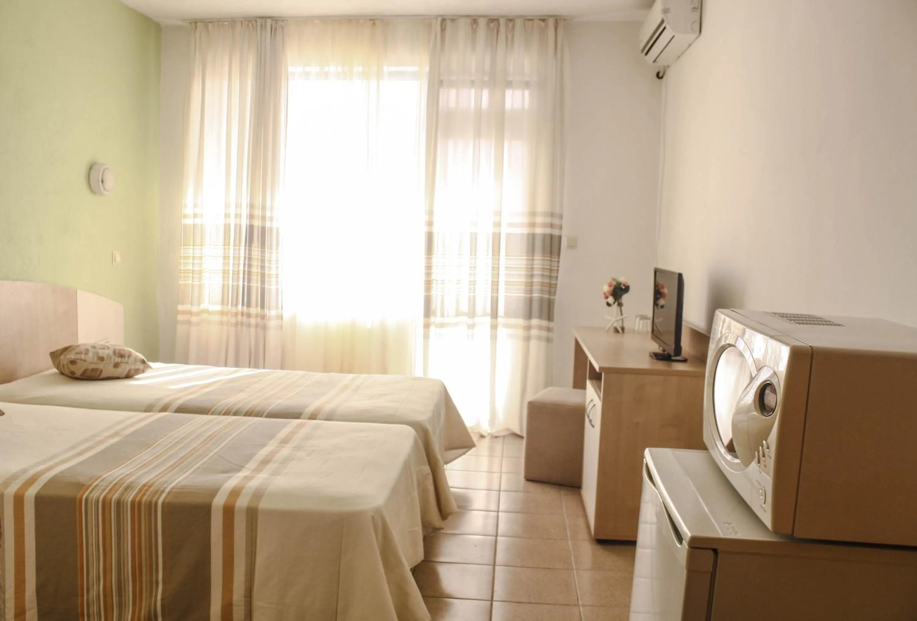 Bed in Alba Family Club Hotel