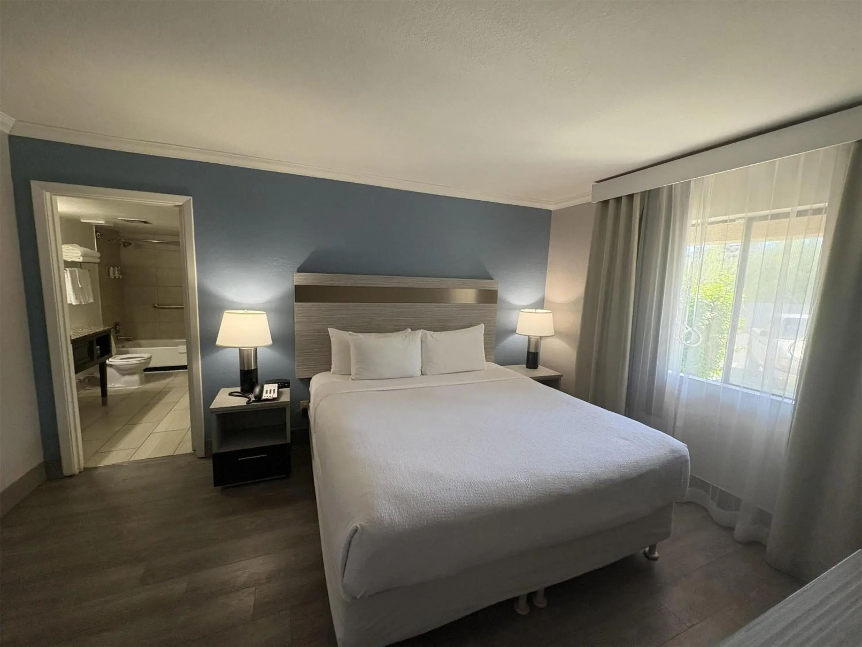 Bedroom, Bed in SureStay InnSuites Phoenix Hotel & Suites by Best Western Bedroom, Bed in SureStay InnSuites Phoenix Hotel & Suites by Best Western