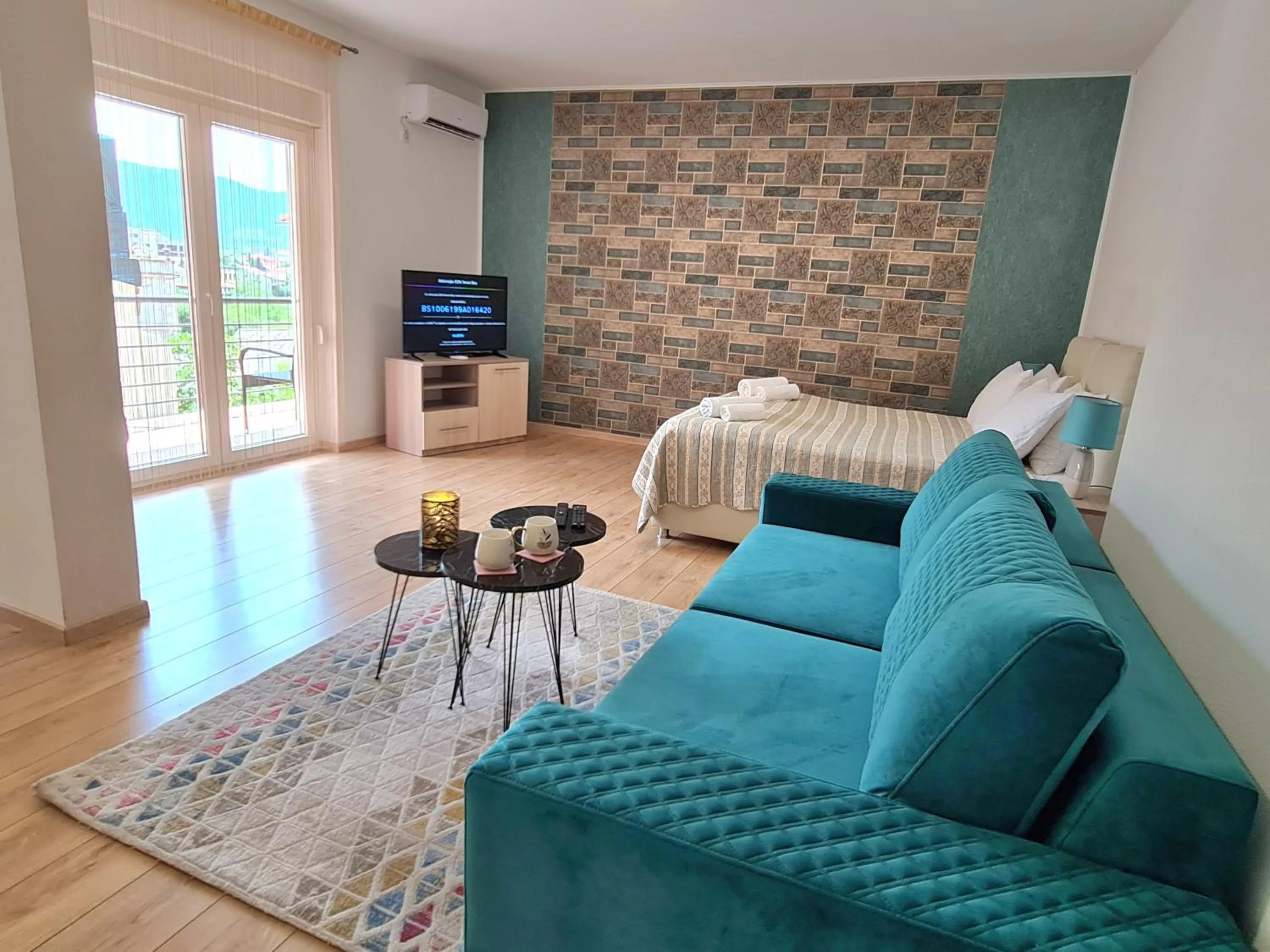 Living room, Bed in Residence Riverside
