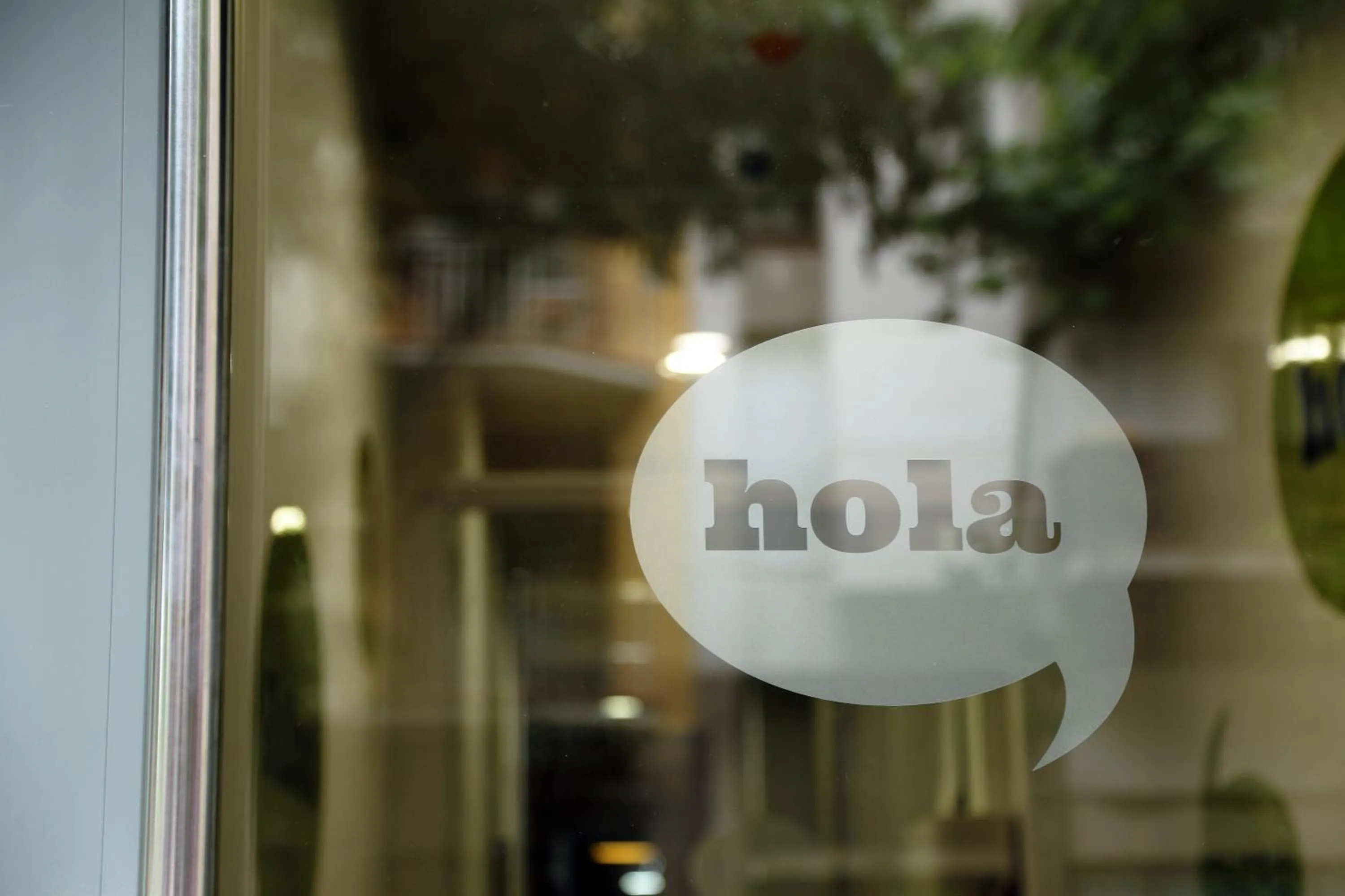 Logo/Certificate/Sign in Hola Hostal Eixample