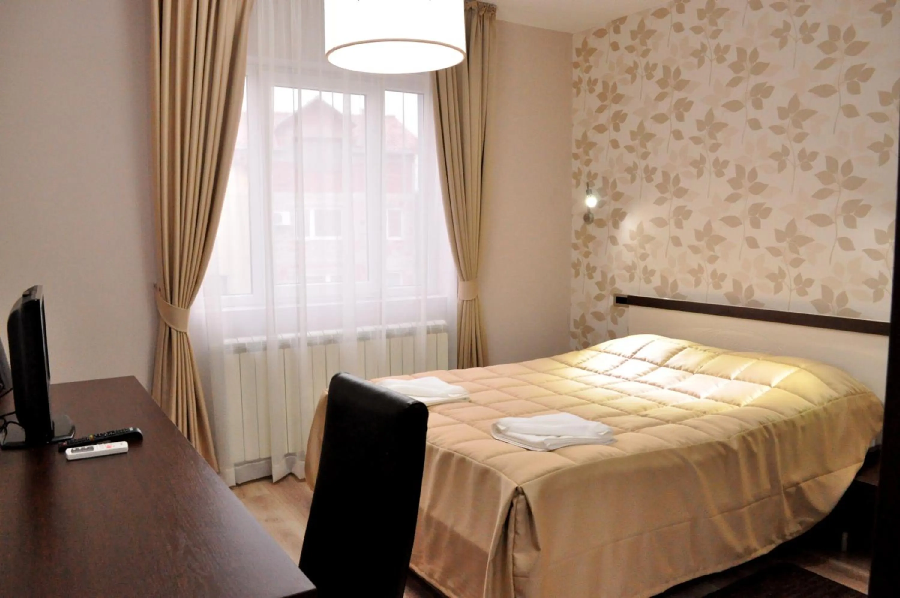 Photo of the whole room, Bed in Garni Hotel 018 In