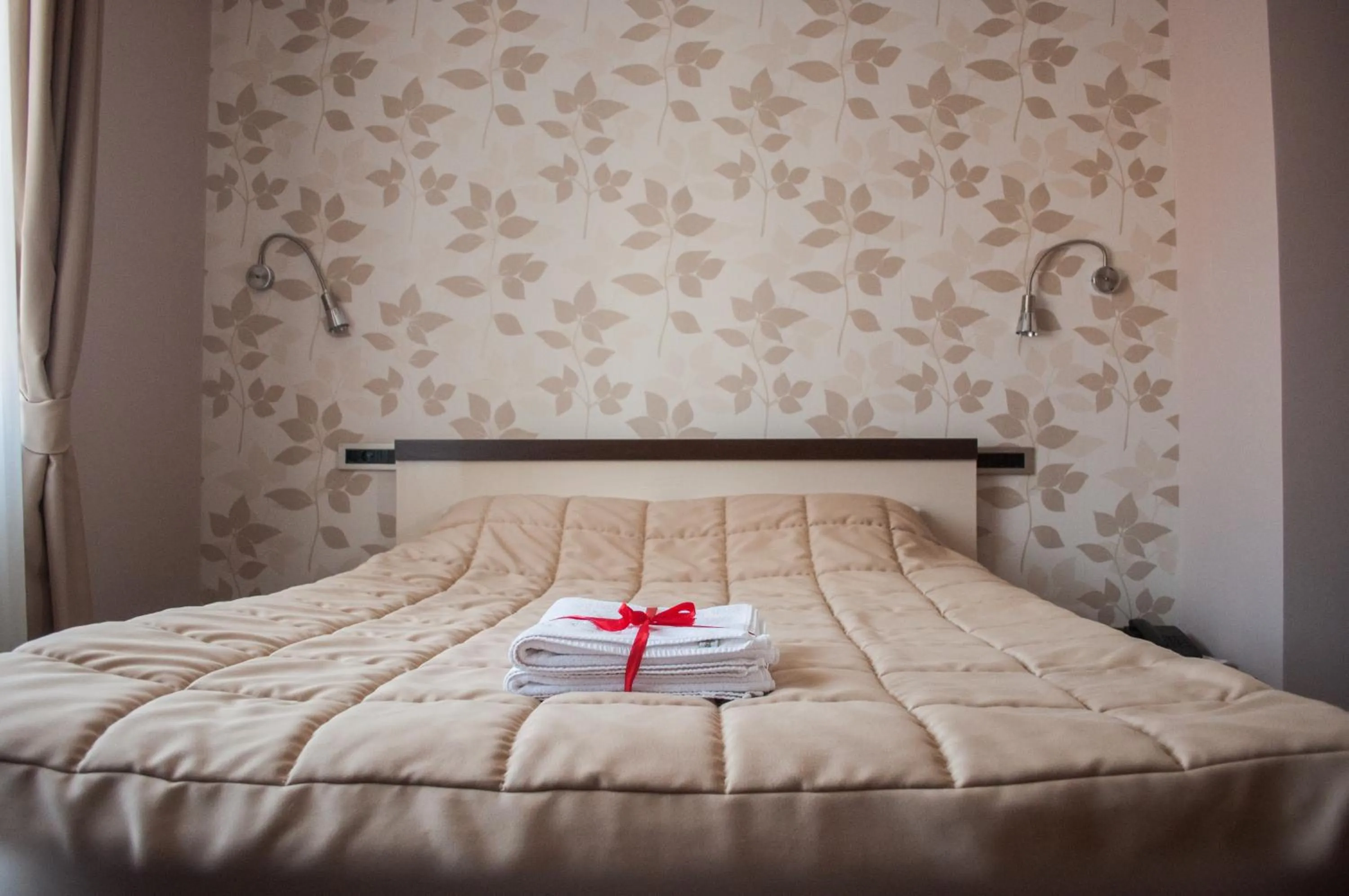 Bed in Garni Hotel 018 In